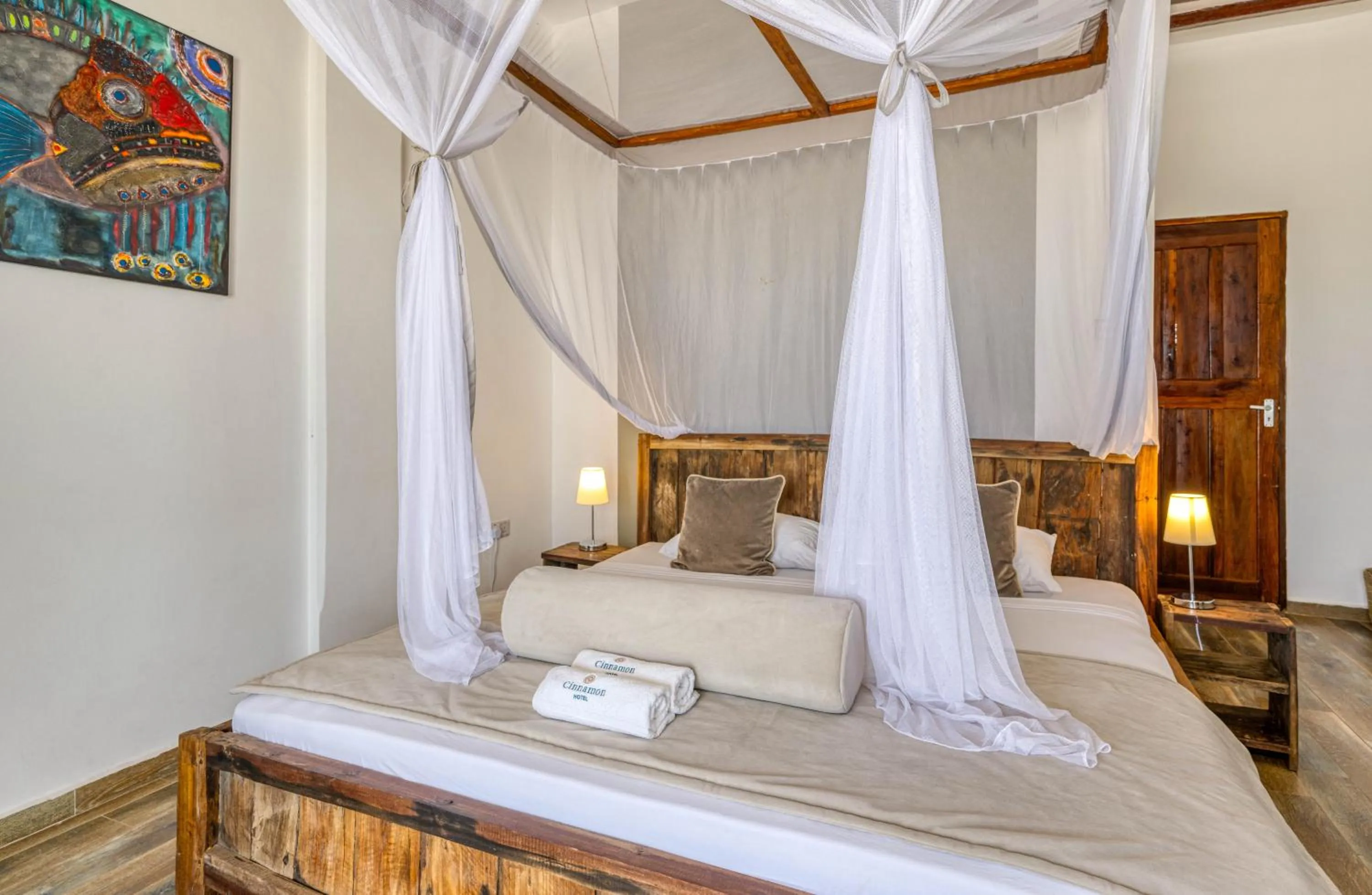 Bed in Cinnamon Hotel