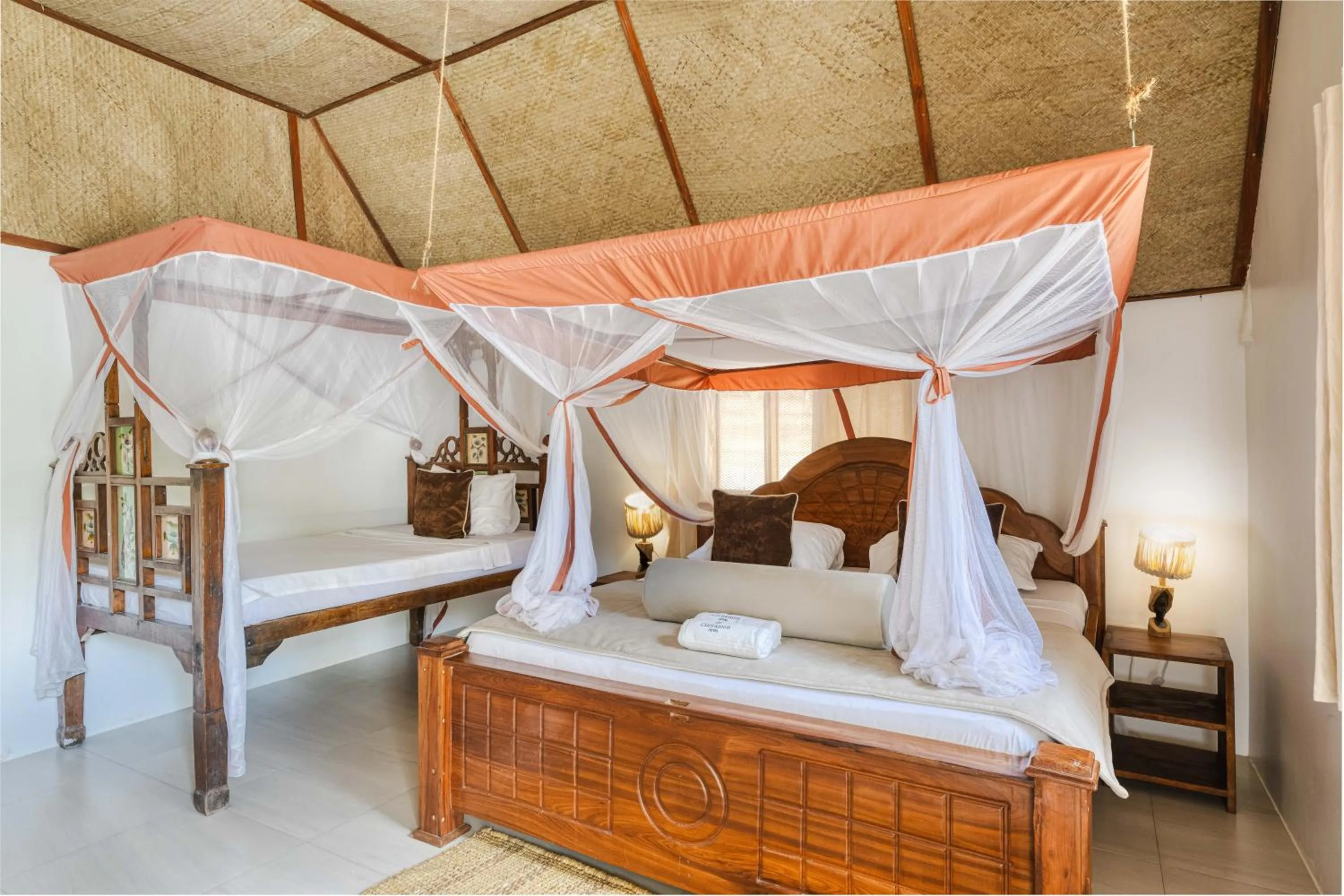 Bed in Cinnamon Hotel