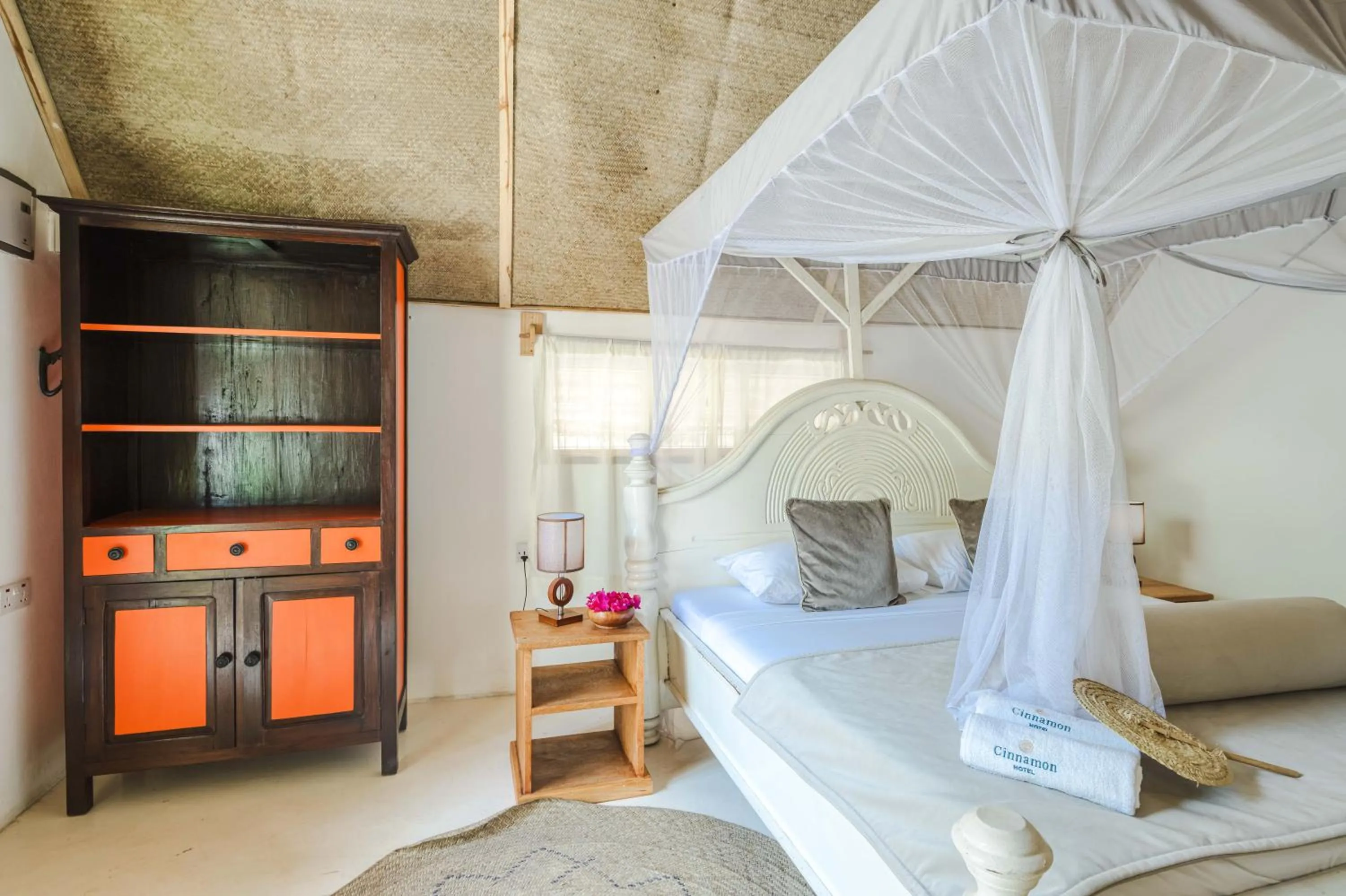 Bed in Cinnamon Hotel