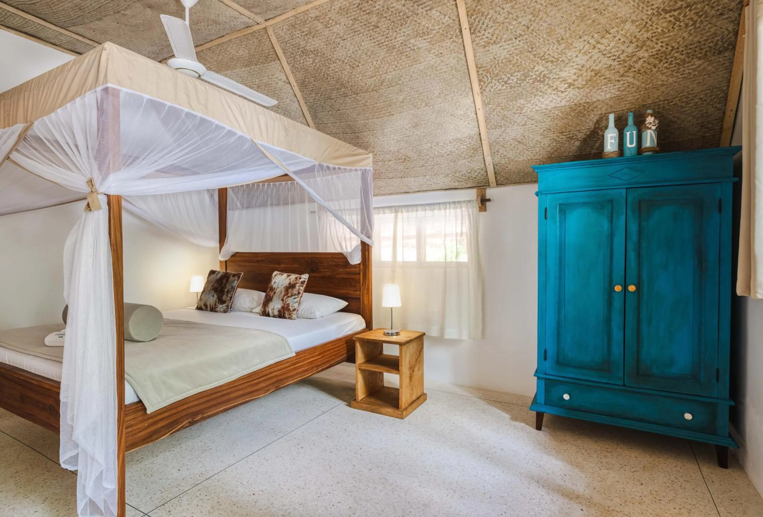 Bed in Cinnamon Hotel