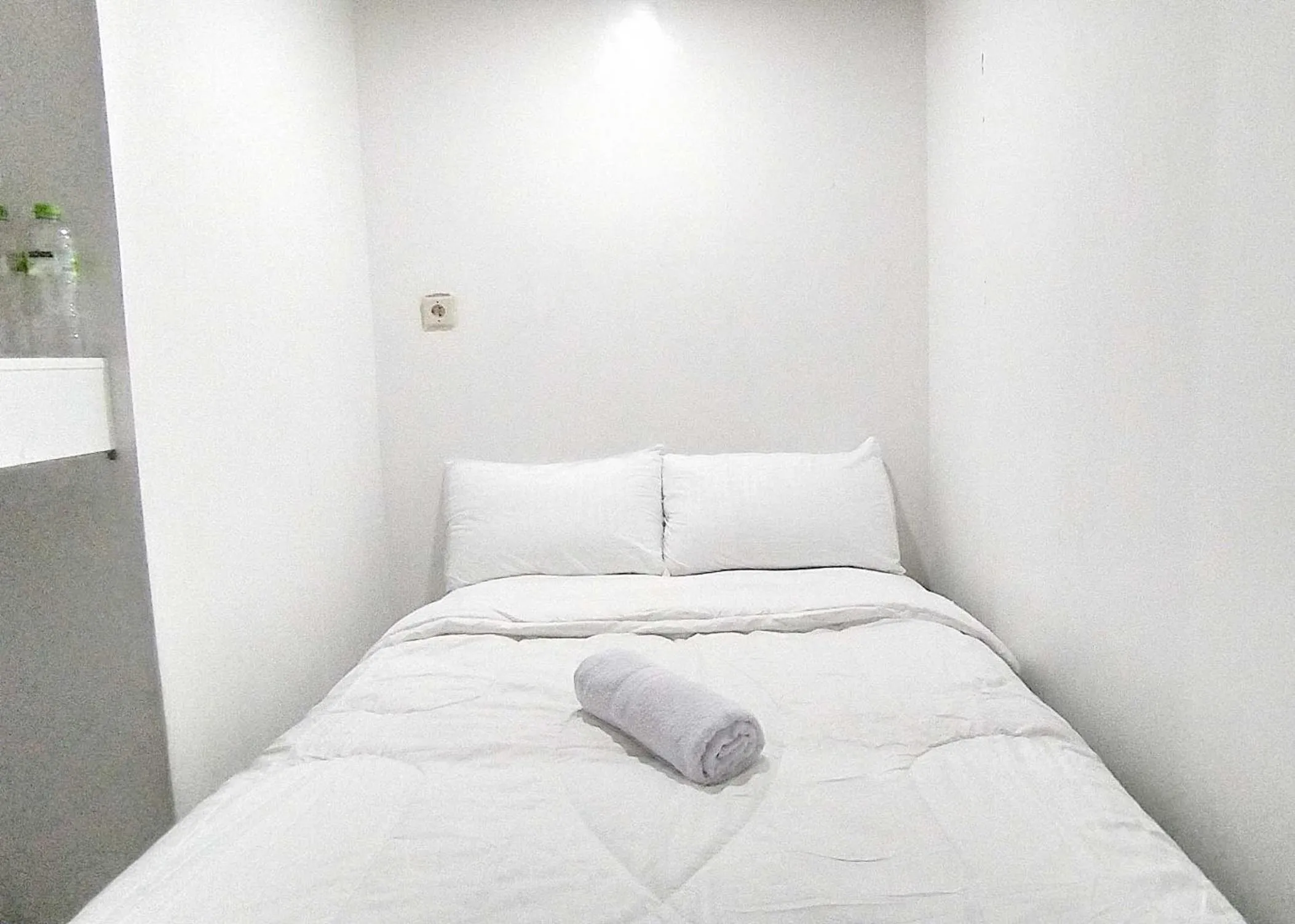 Bed in Guest House Kembar Syariah Semarang RedPartner