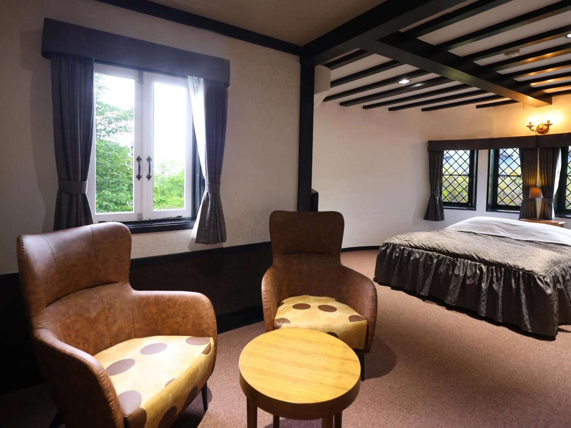 Bed in Petit Hotel & Restaurant Old Age