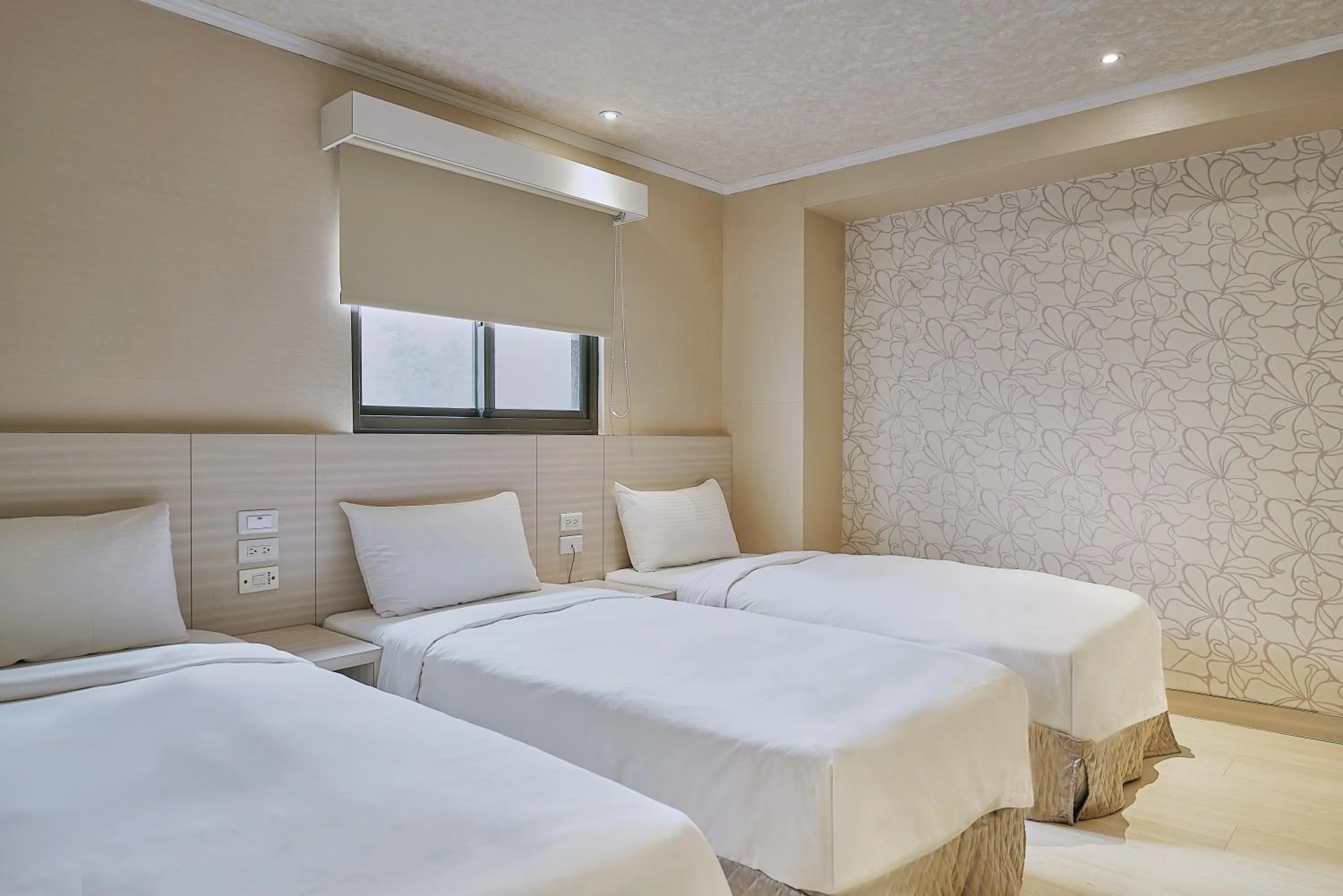 Bed in Golden Stone Hotel