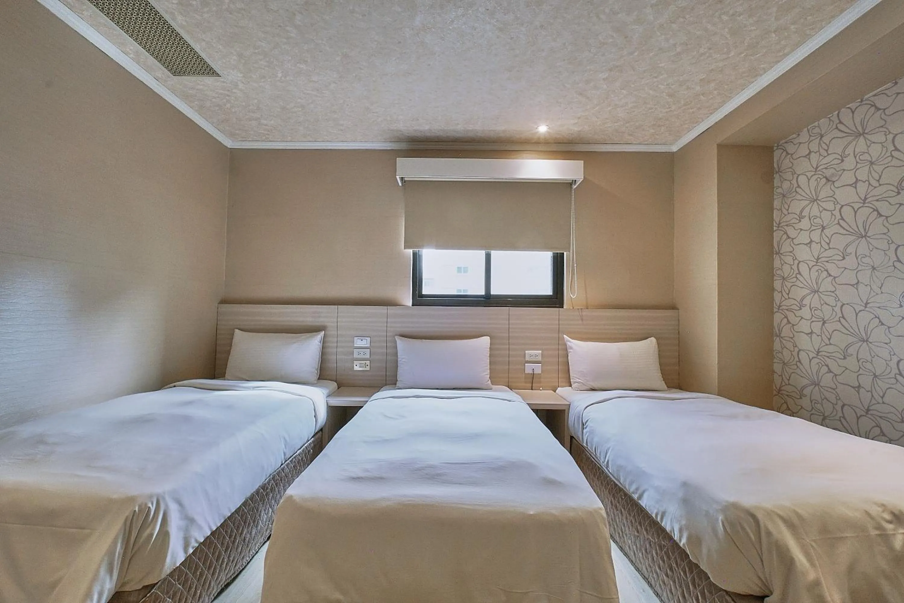 Bed in Golden Stone Hotel