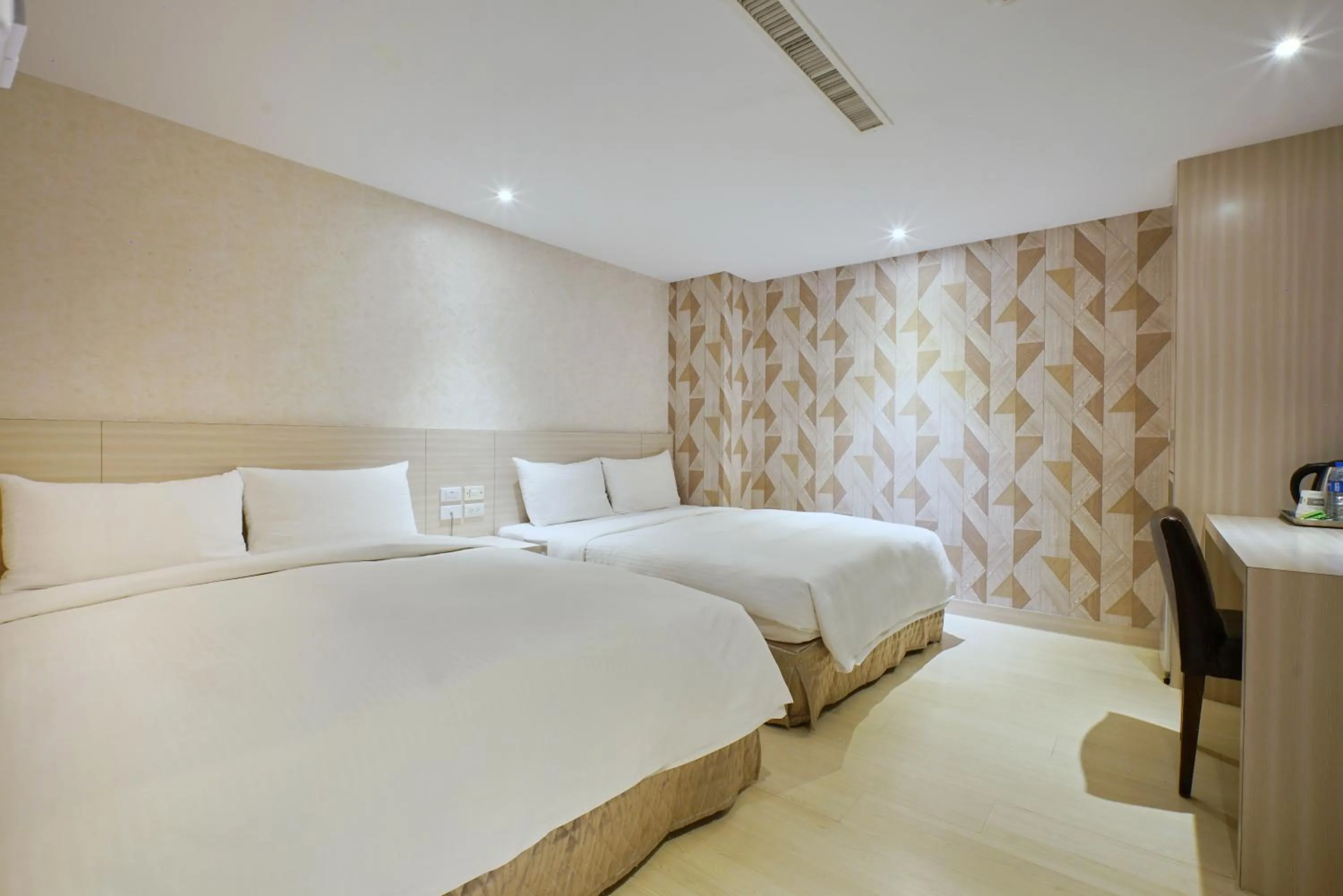 Bed in Golden Stone Hotel