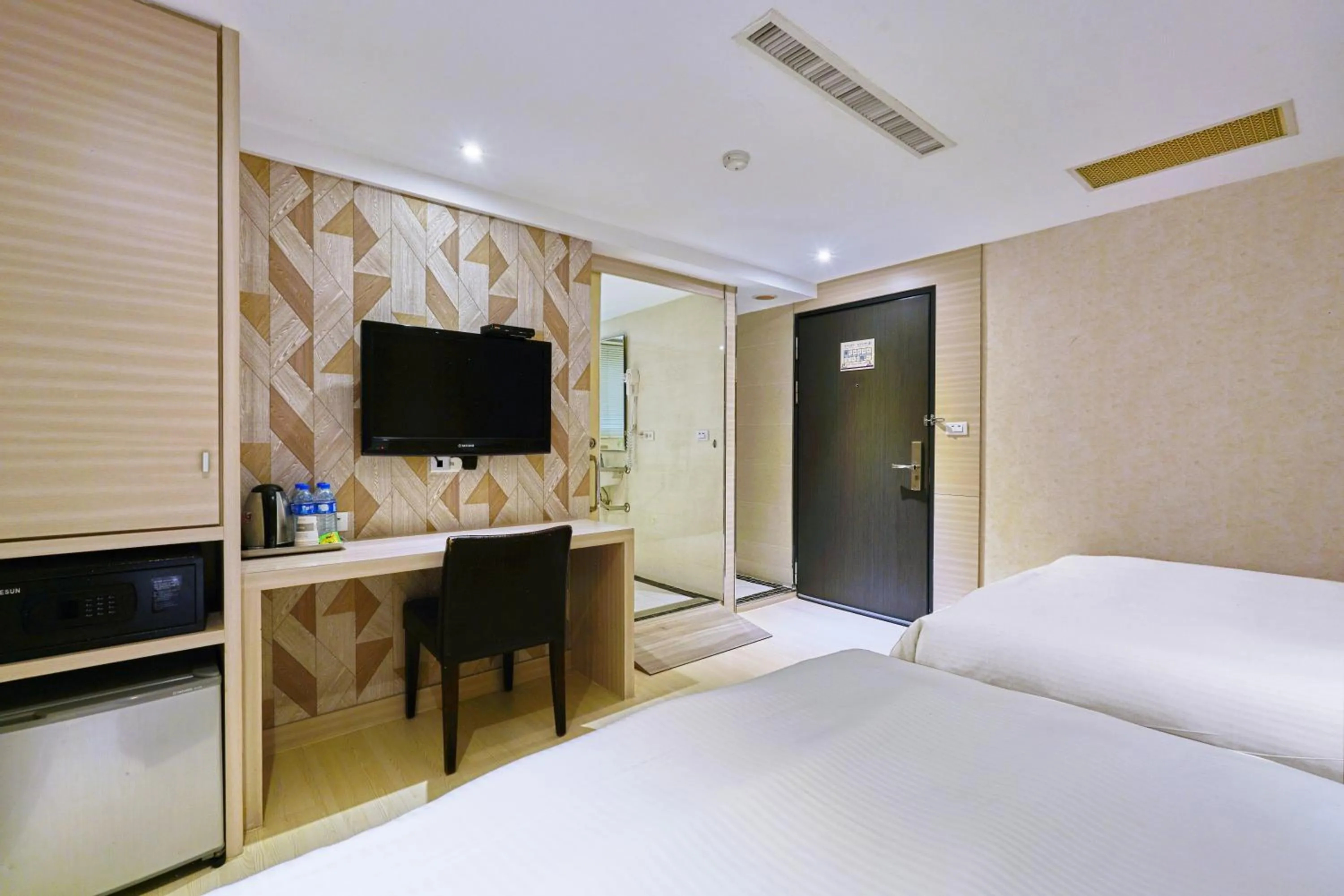 Bed in Golden Stone Hotel