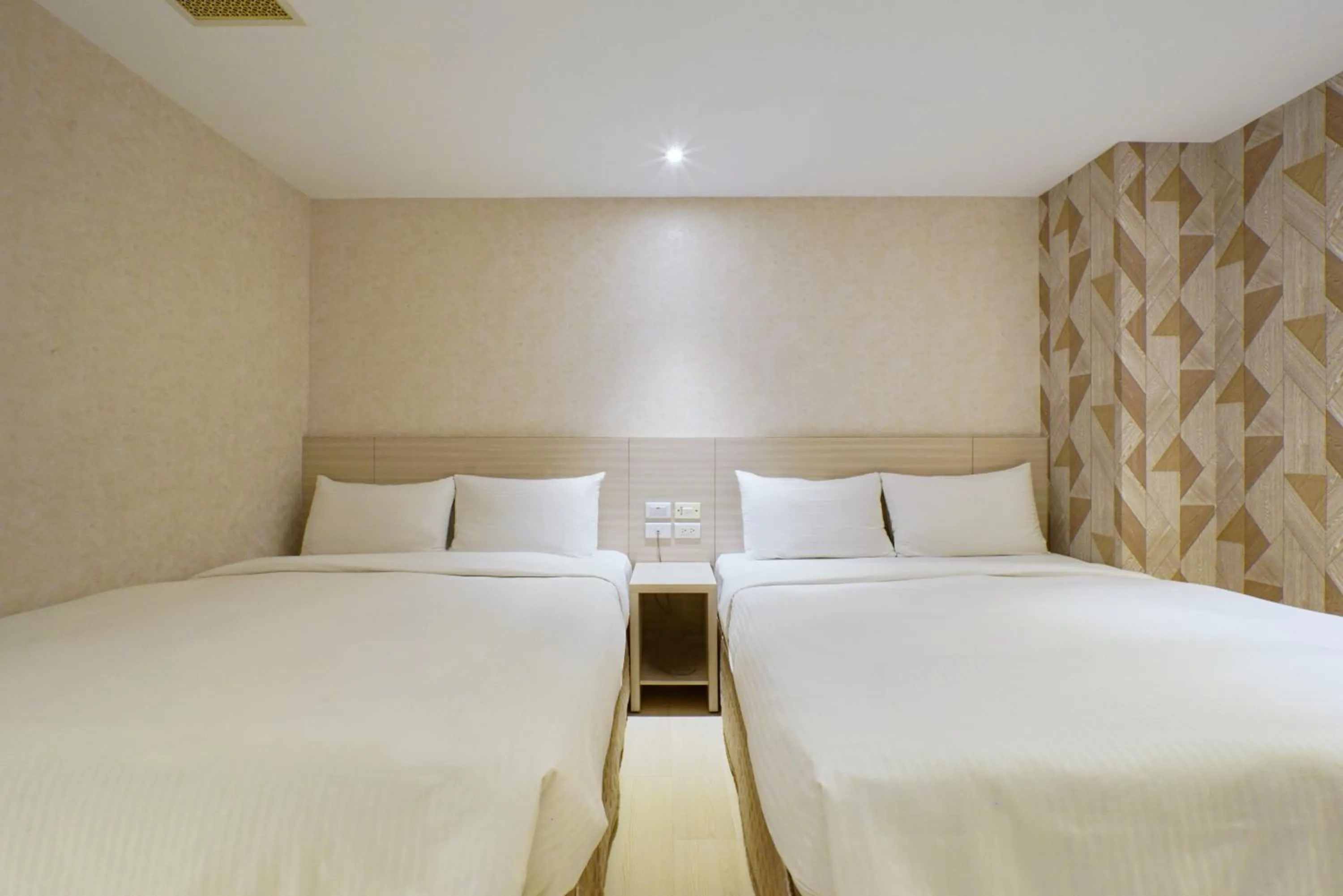 Bed in Golden Stone Hotel