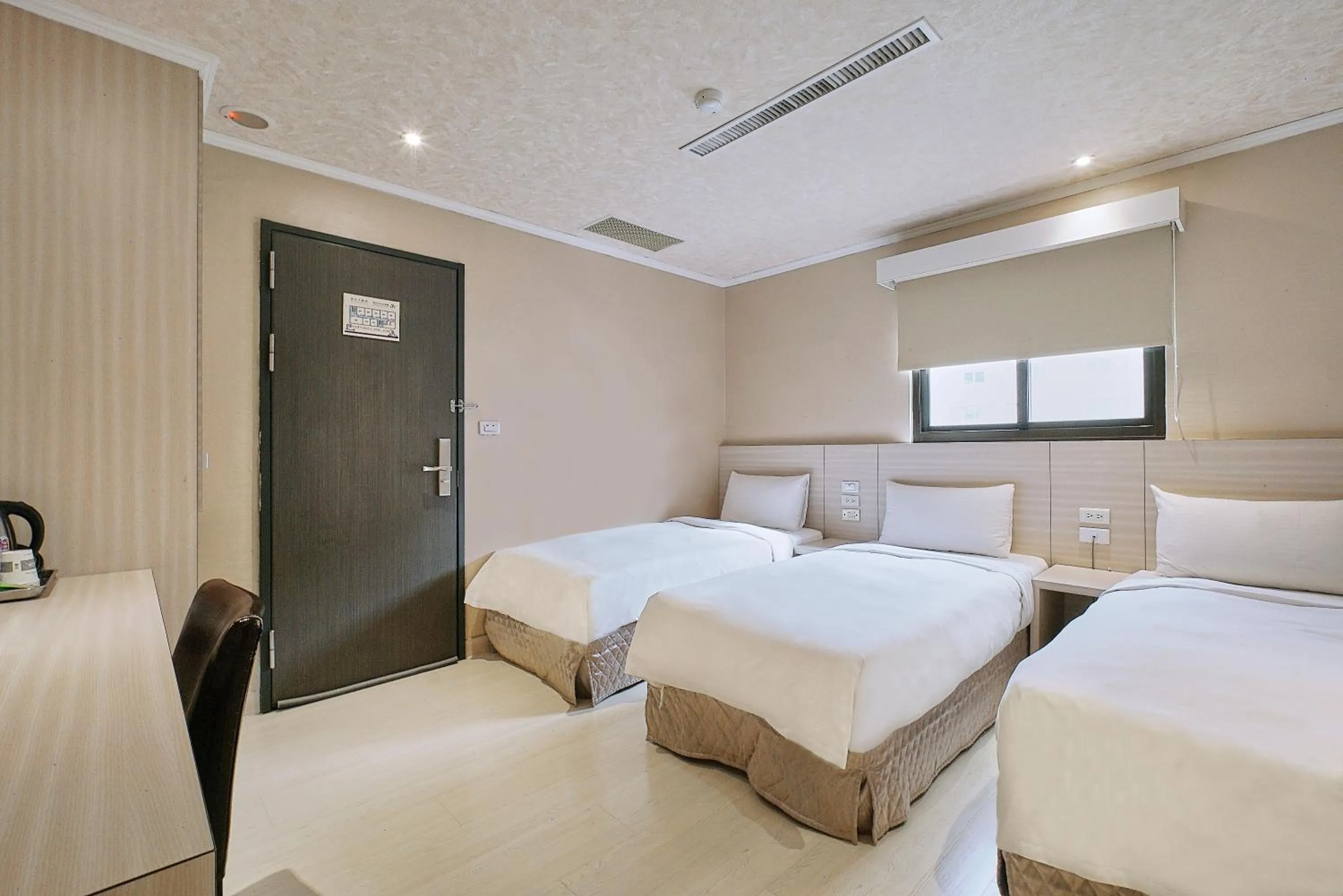 Bed in Golden Stone Hotel