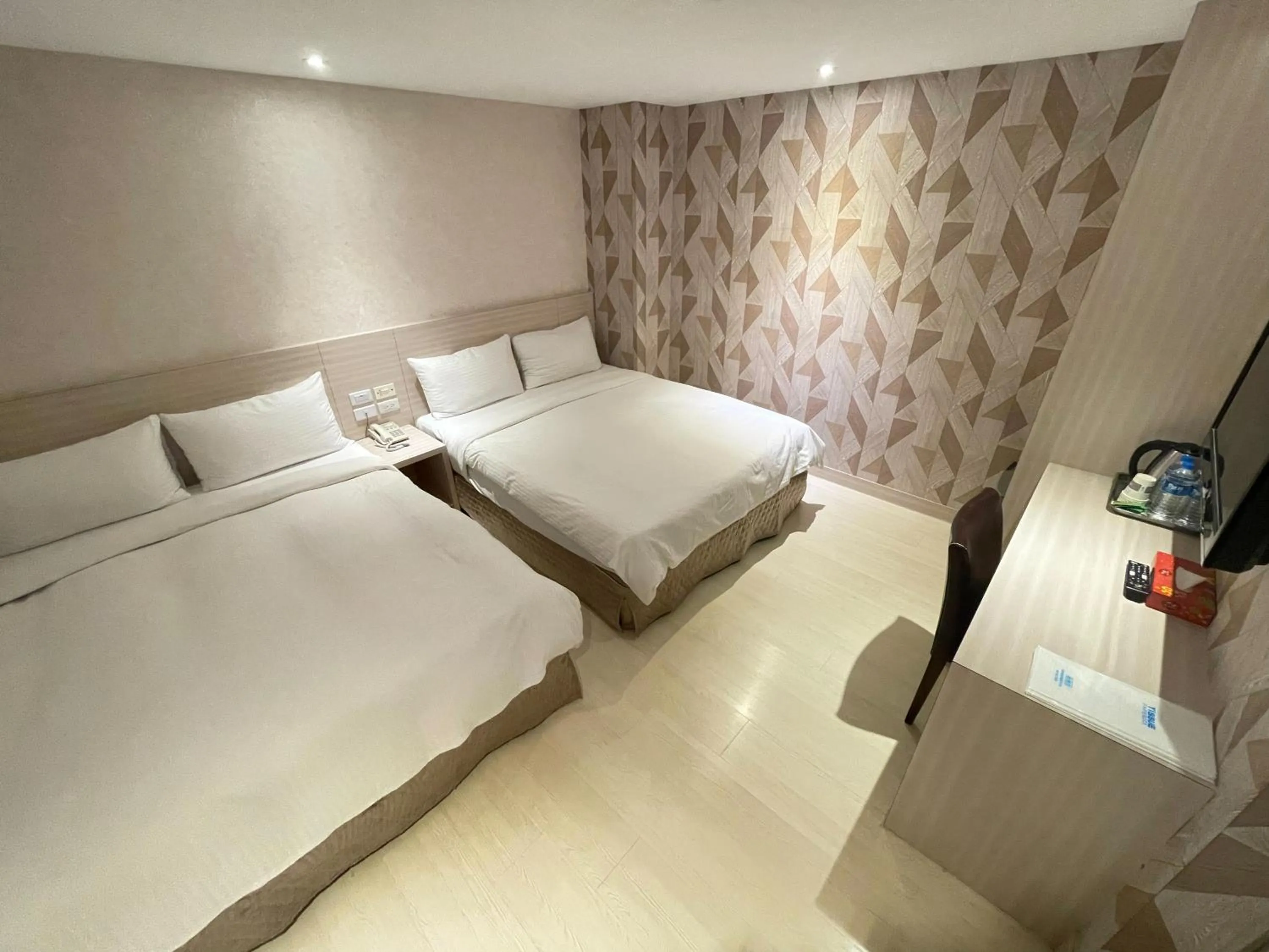 Bed in Golden Stone Hotel