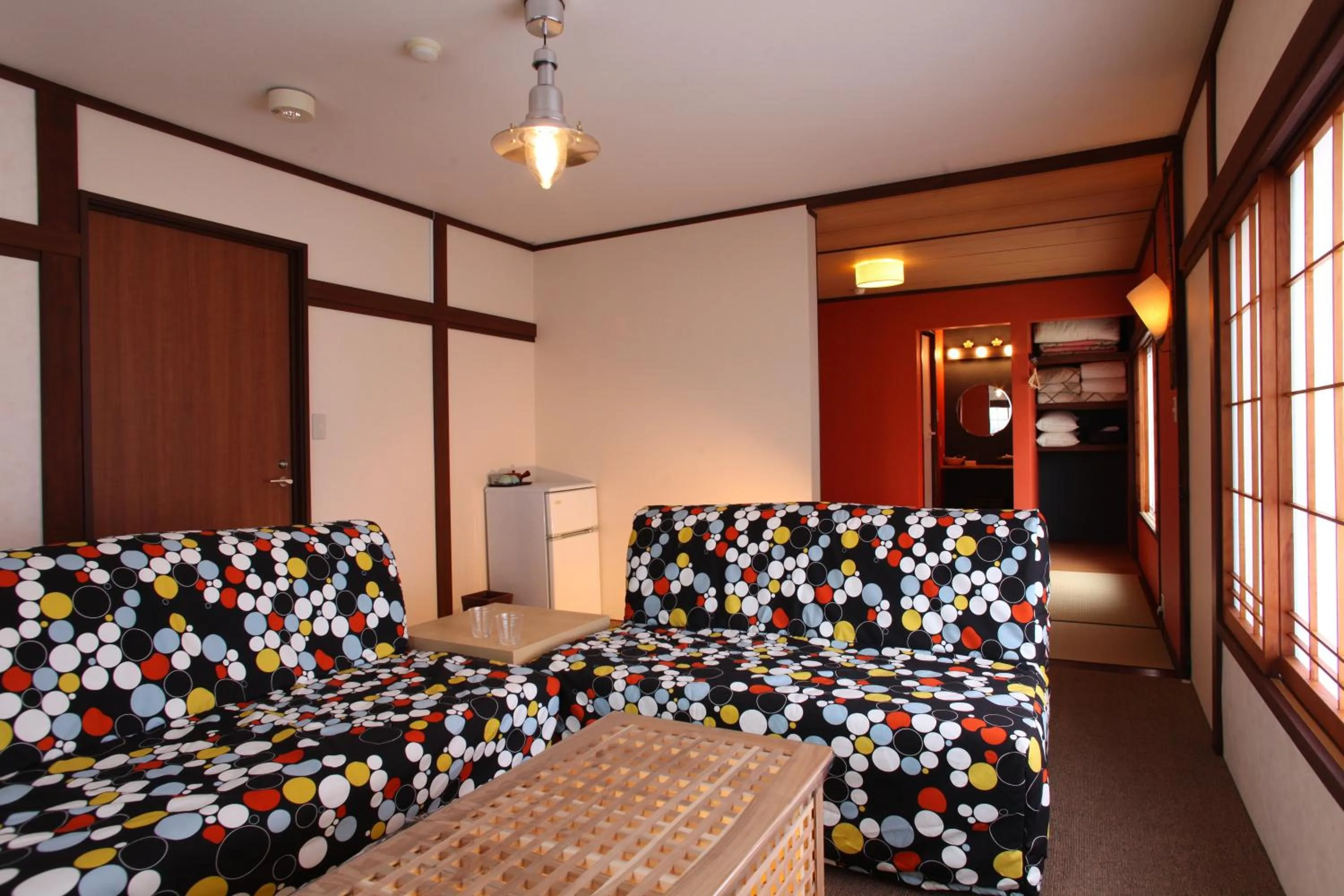 Seating area, Bed in Beach Commune Simploose (Adult Only)