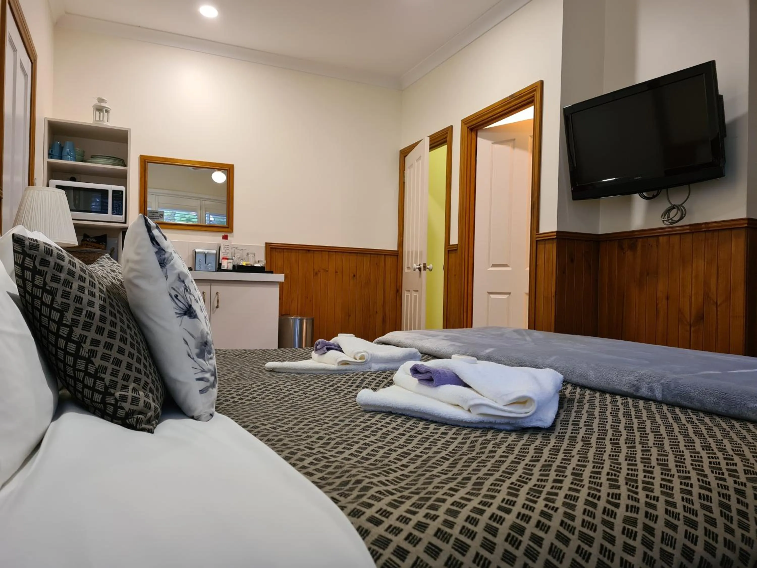 Bed in Forest Lodge Resort