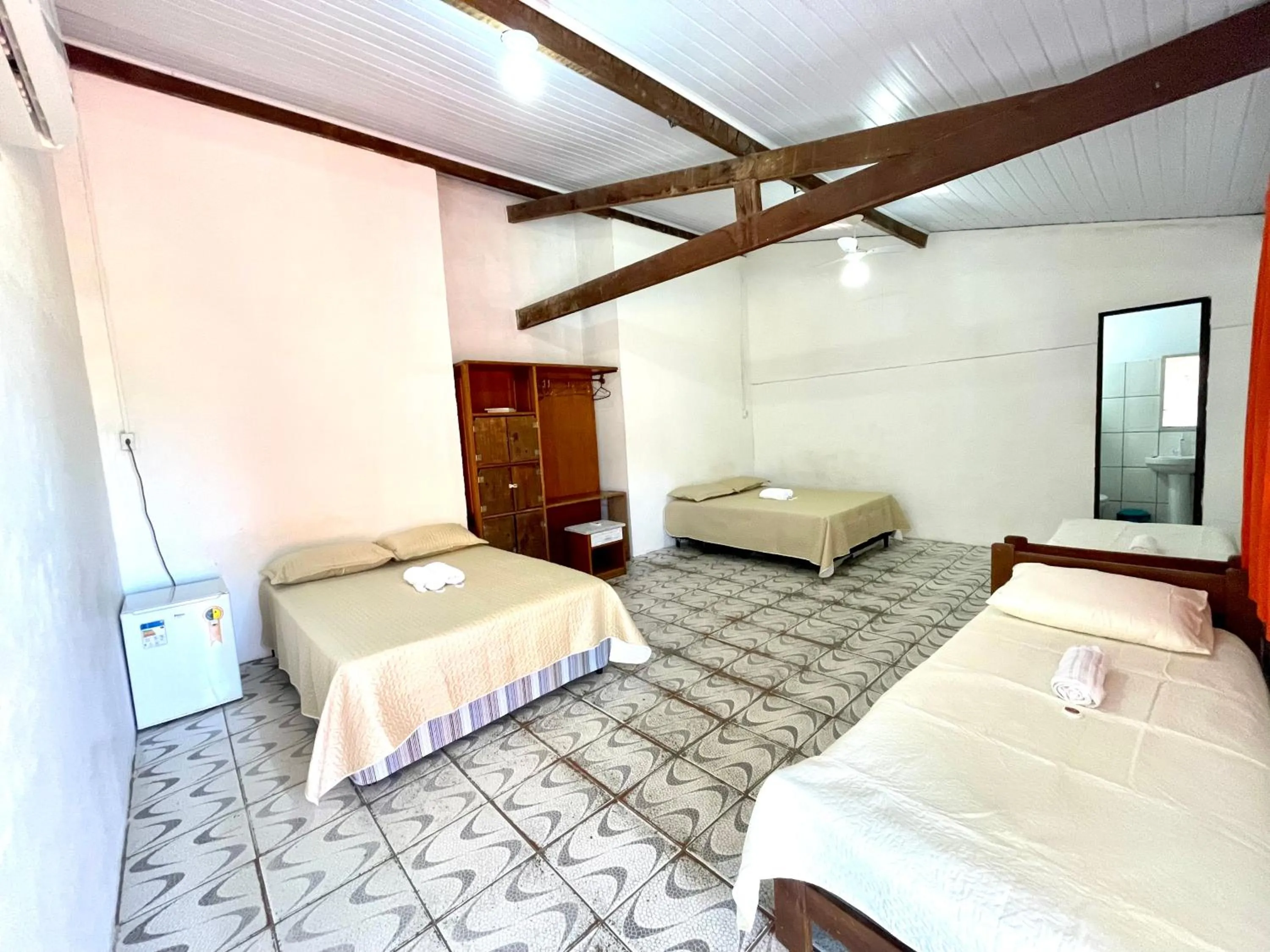Bed in Pousada Kawaii