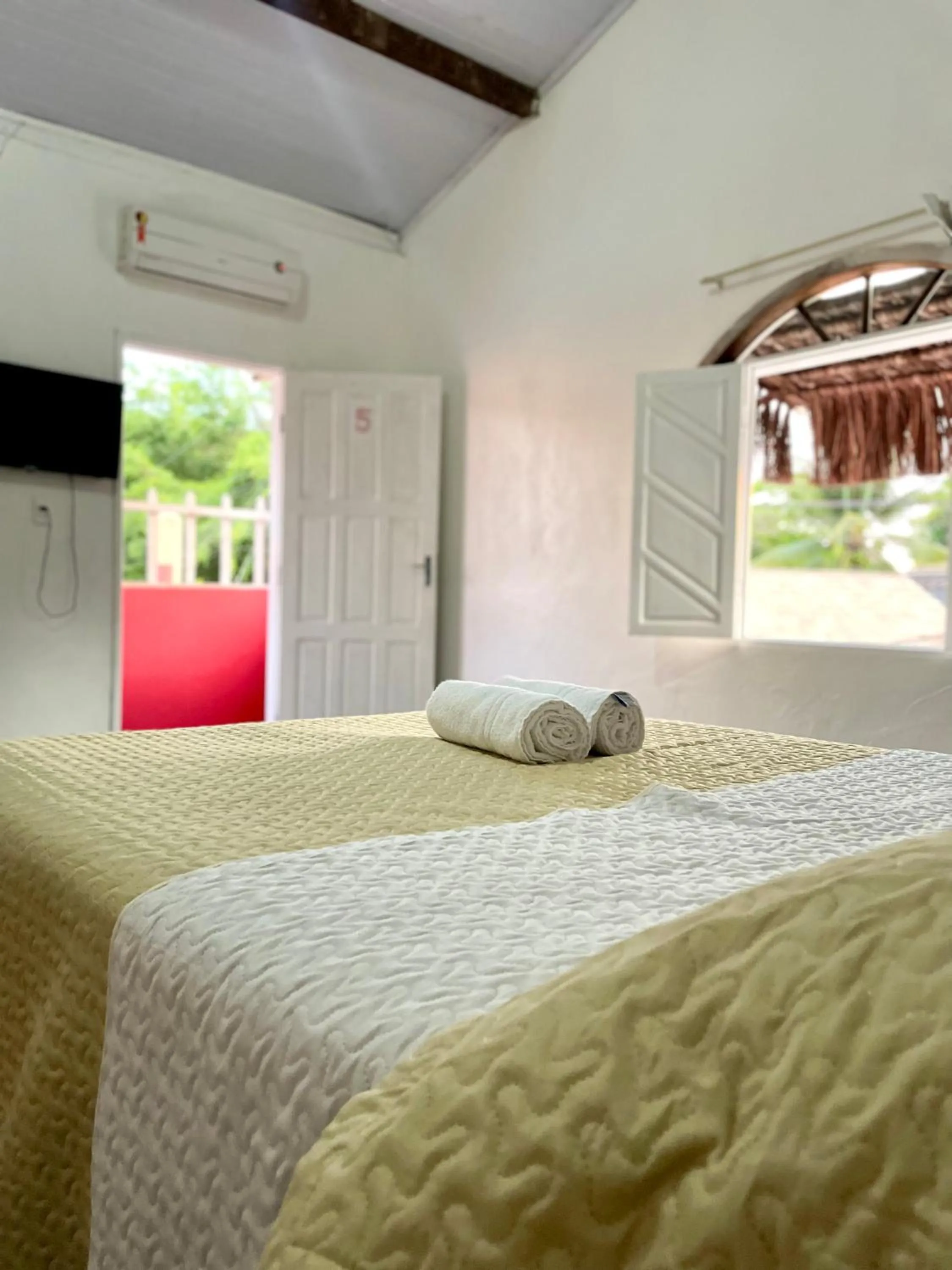 Bed in Pousada Kawaii