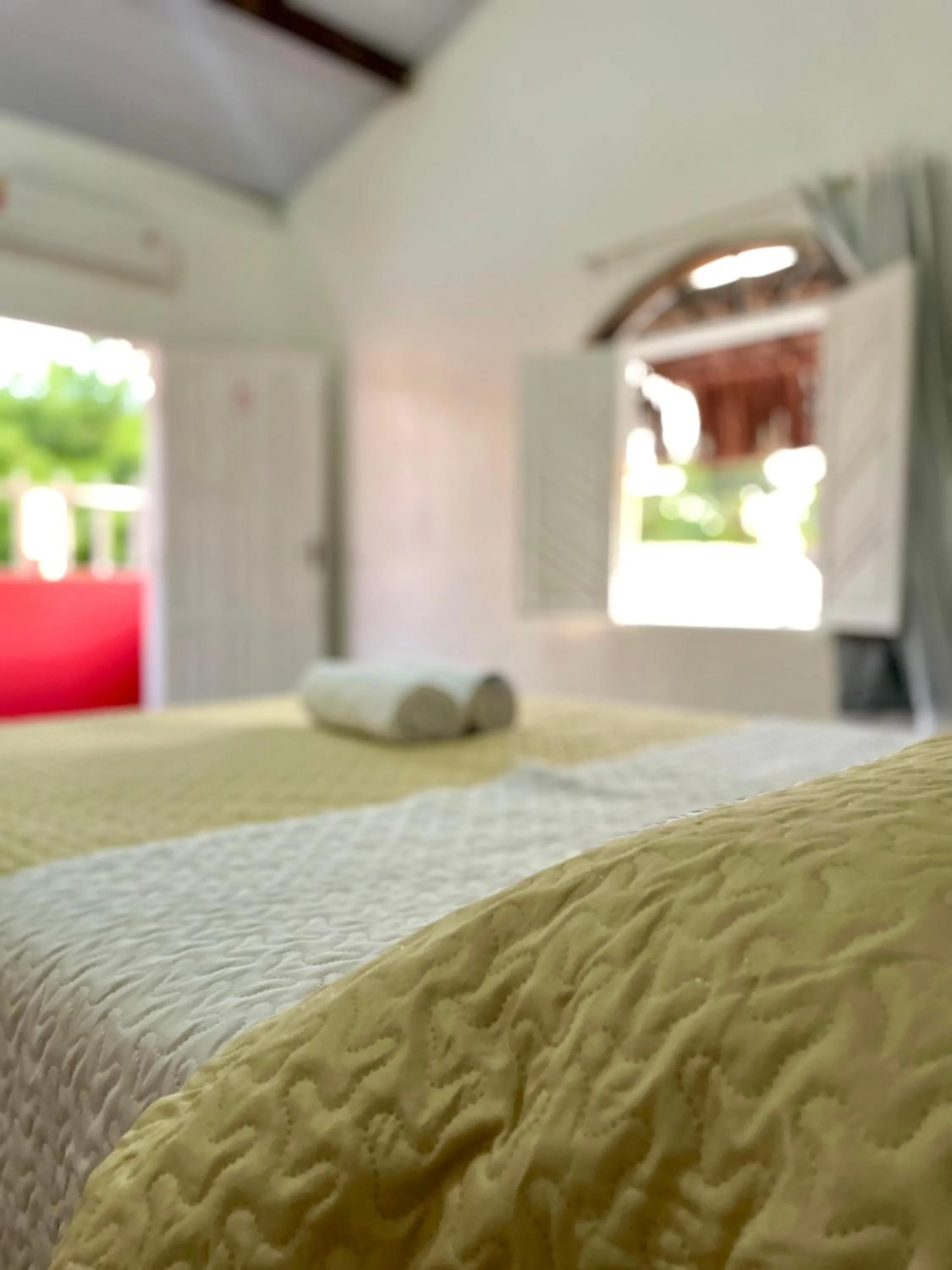 Bed in Pousada Kawaii