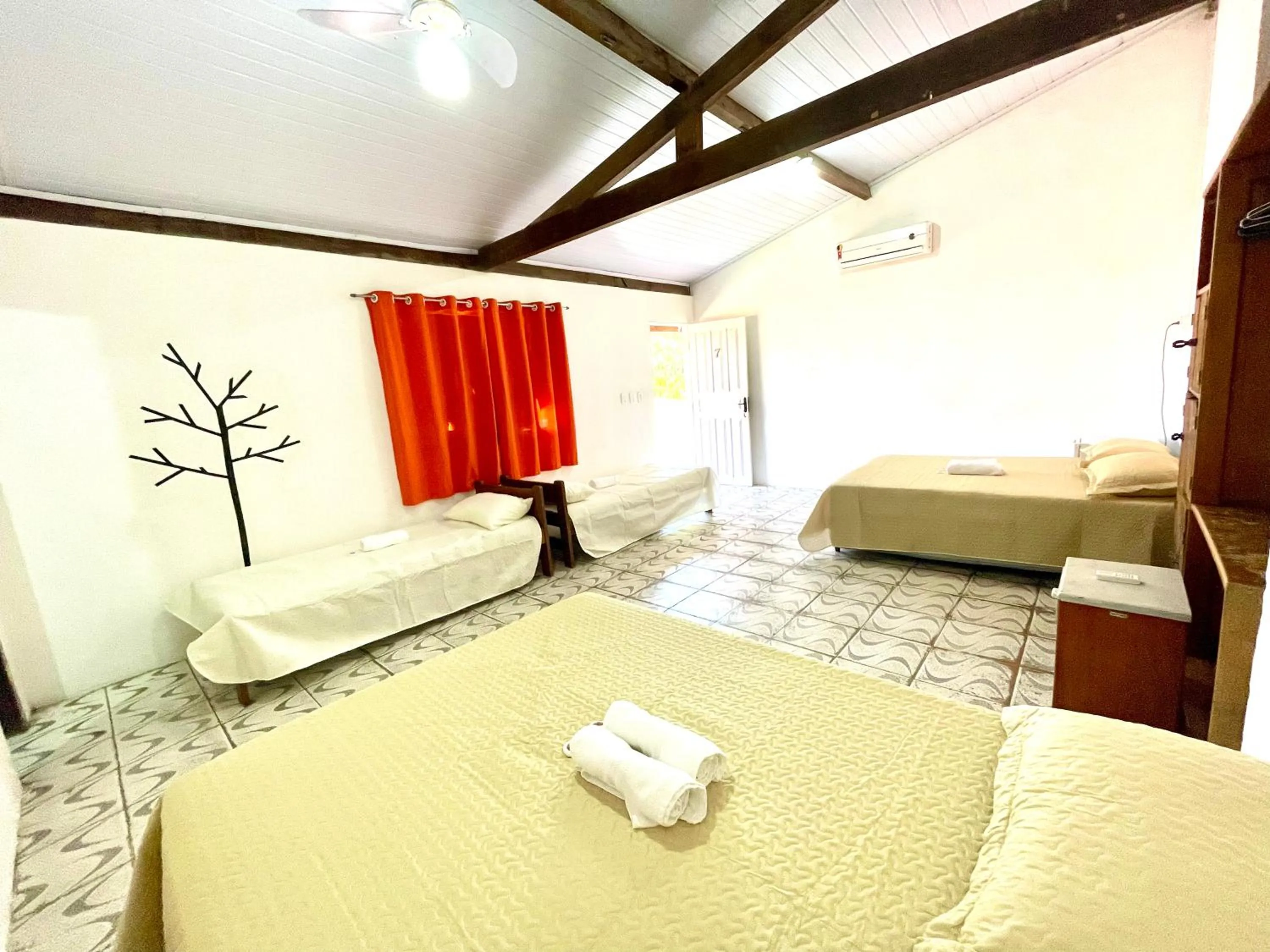Bed in Pousada Kawaii