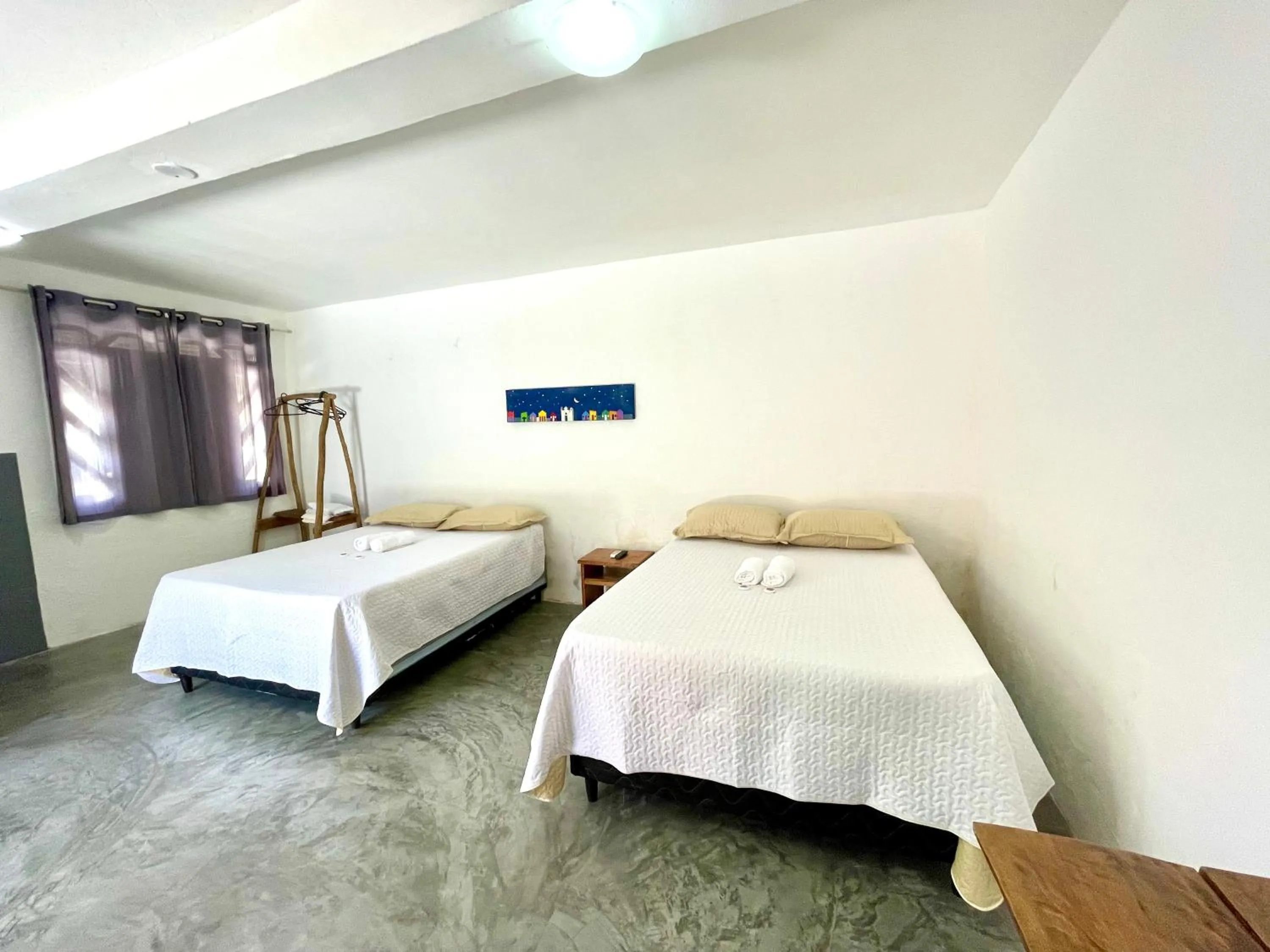Bed in Pousada Kawaii