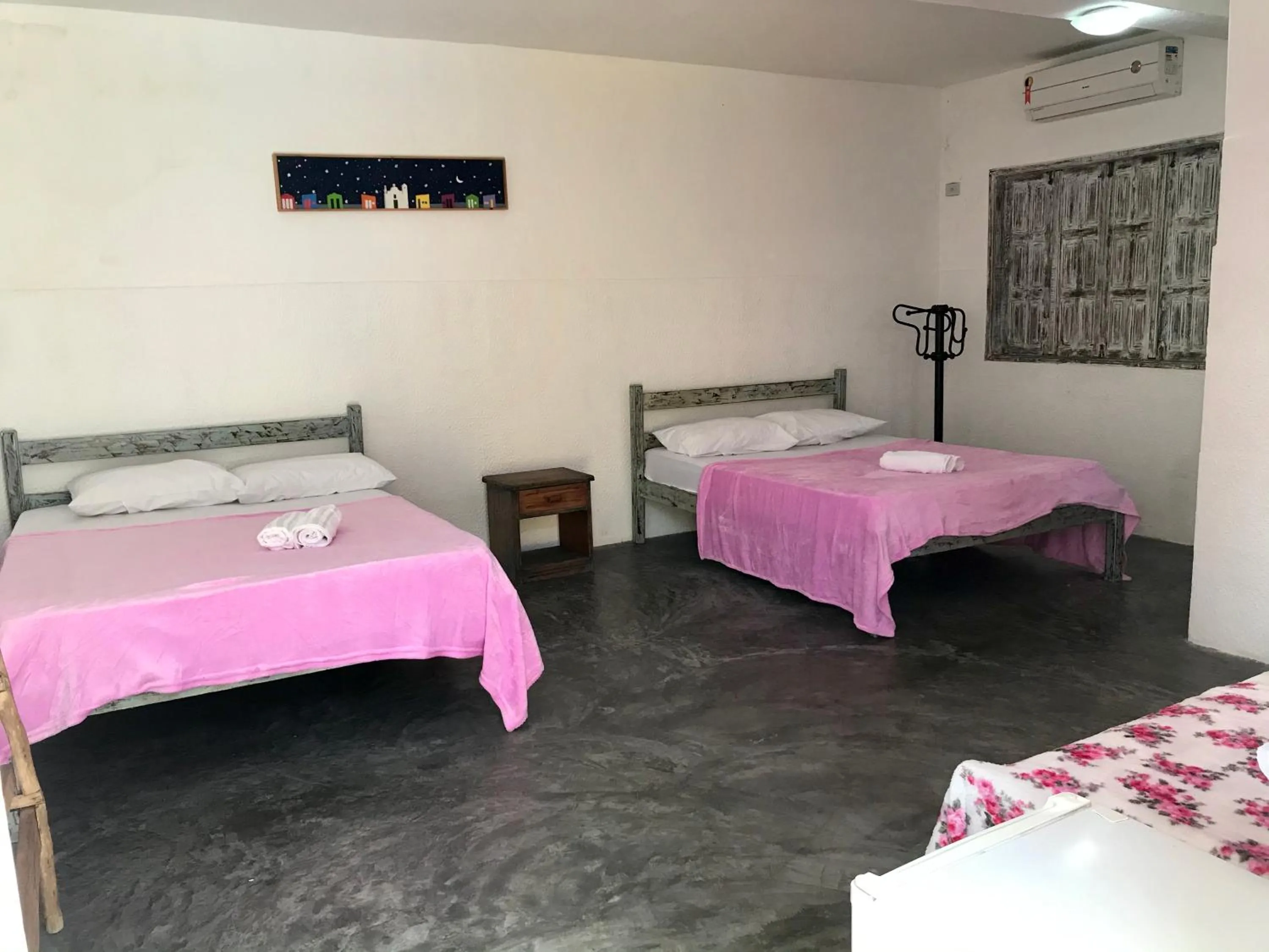 Bed in Pousada Kawaii