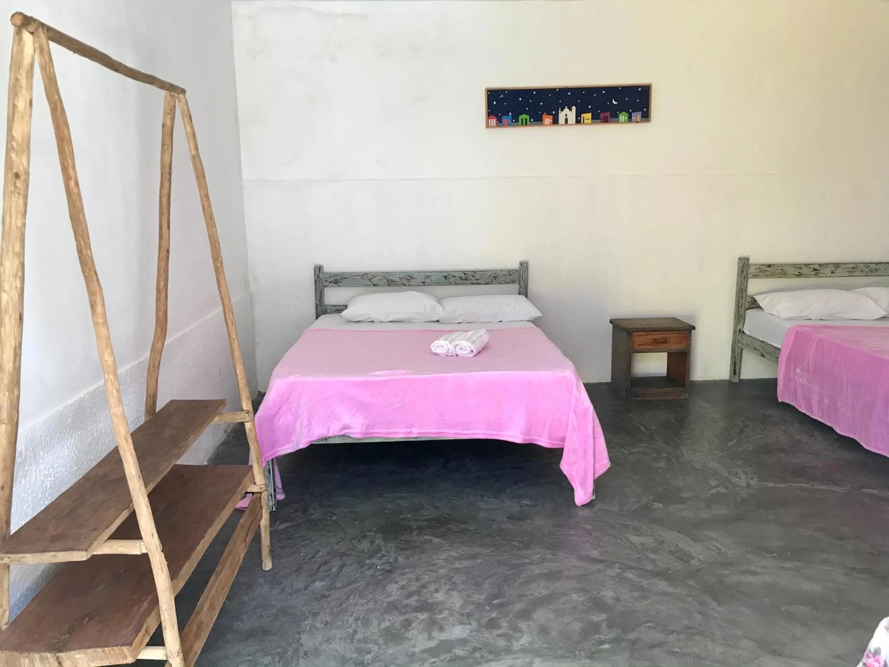 Bed in Pousada Kawaii