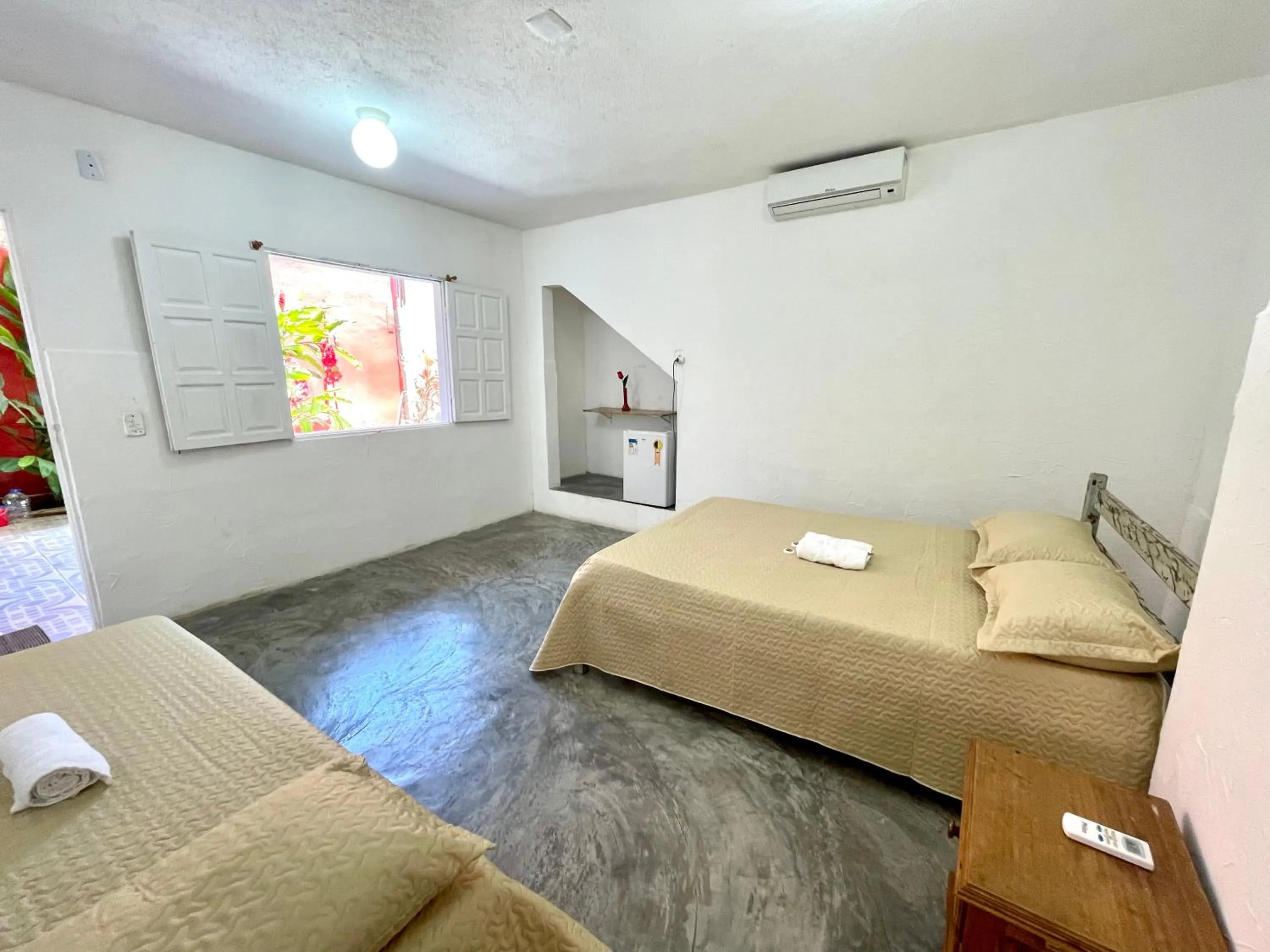 Bed in Pousada Kawaii