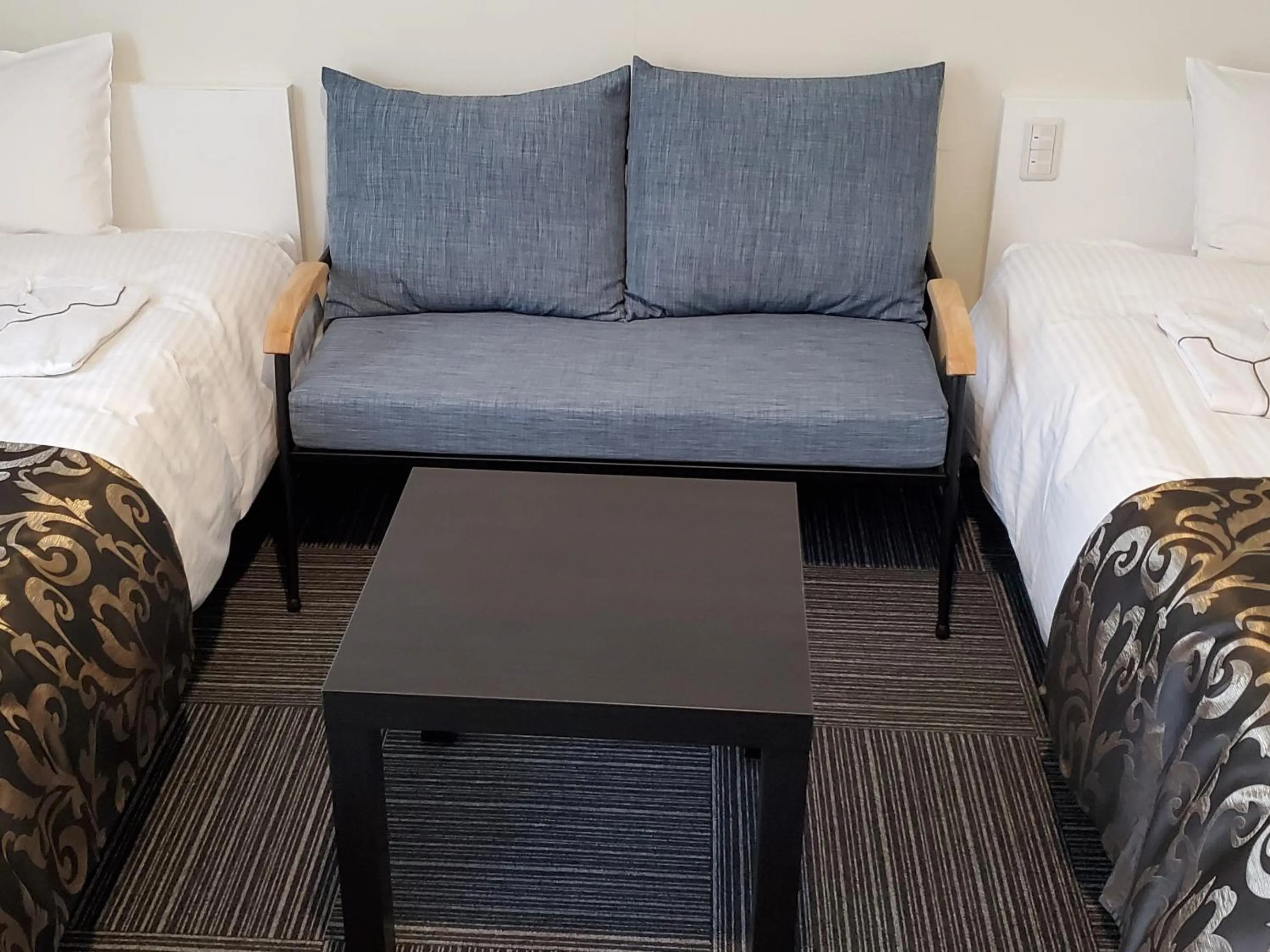 Photo of the whole room, Bed in Tachikawa Regent Hotel