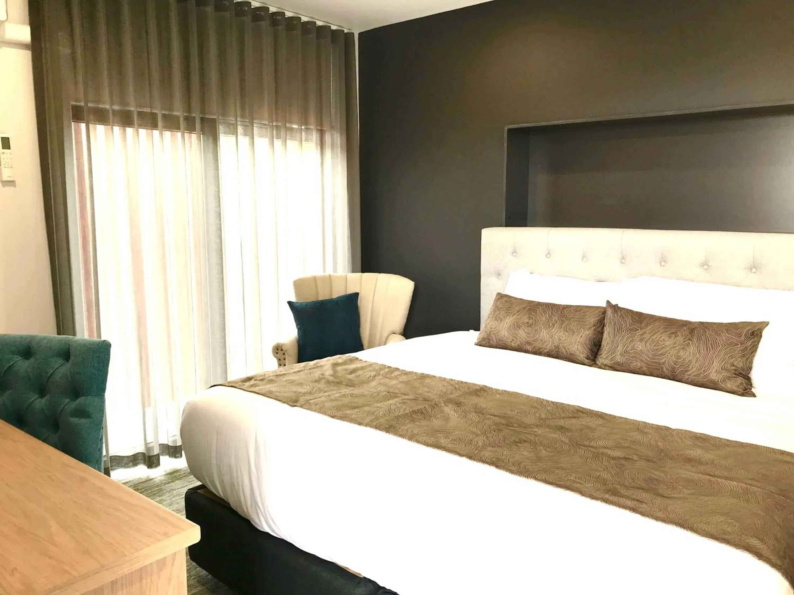 Bed in The Osmond Motel & Apartments Bed in The Osmond Motel & Apartments