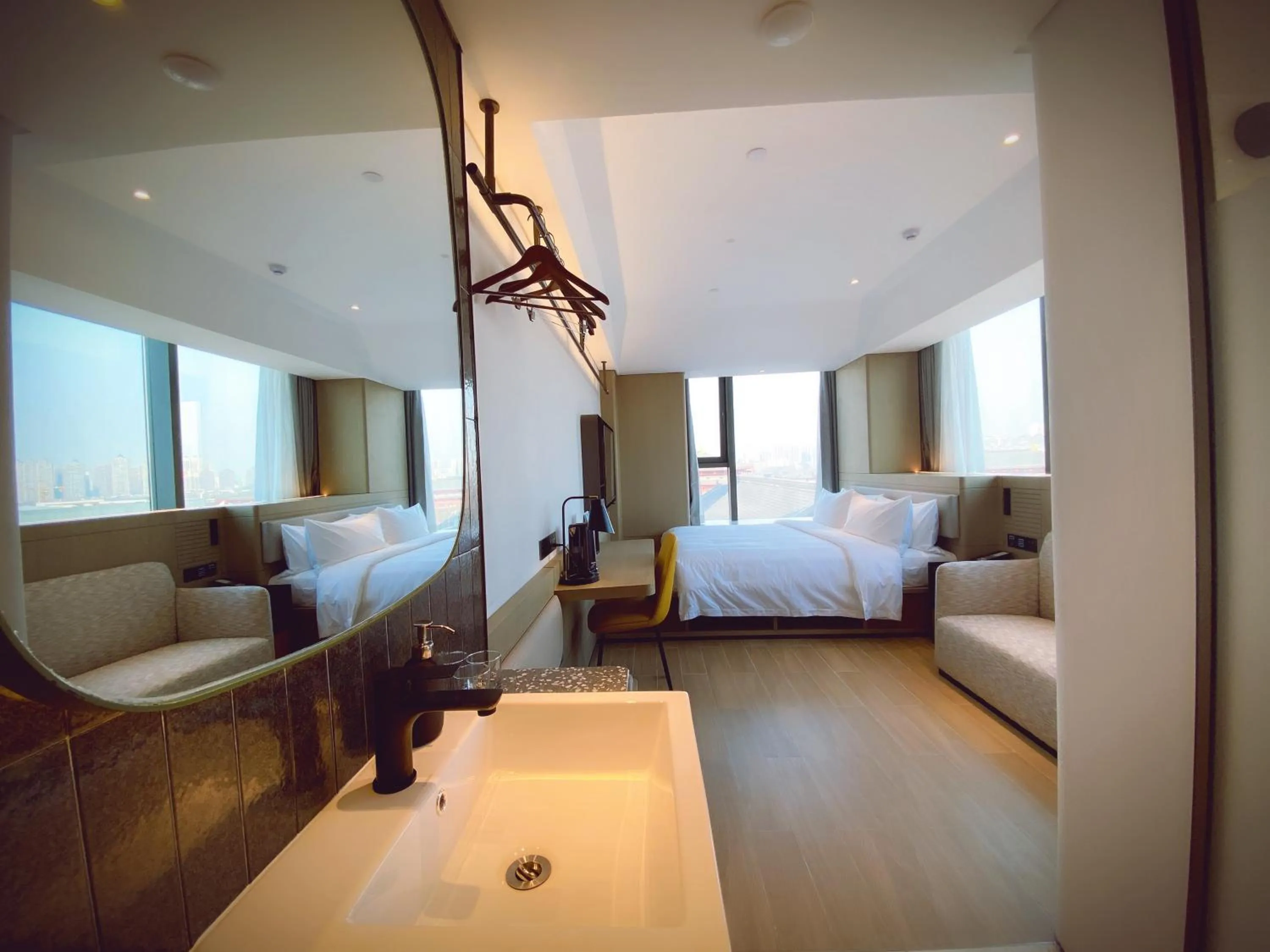 Photo of the whole room, Bed in lyf Dayanta Xi'an by the Ascott Limited free gym & free park & free laundry room