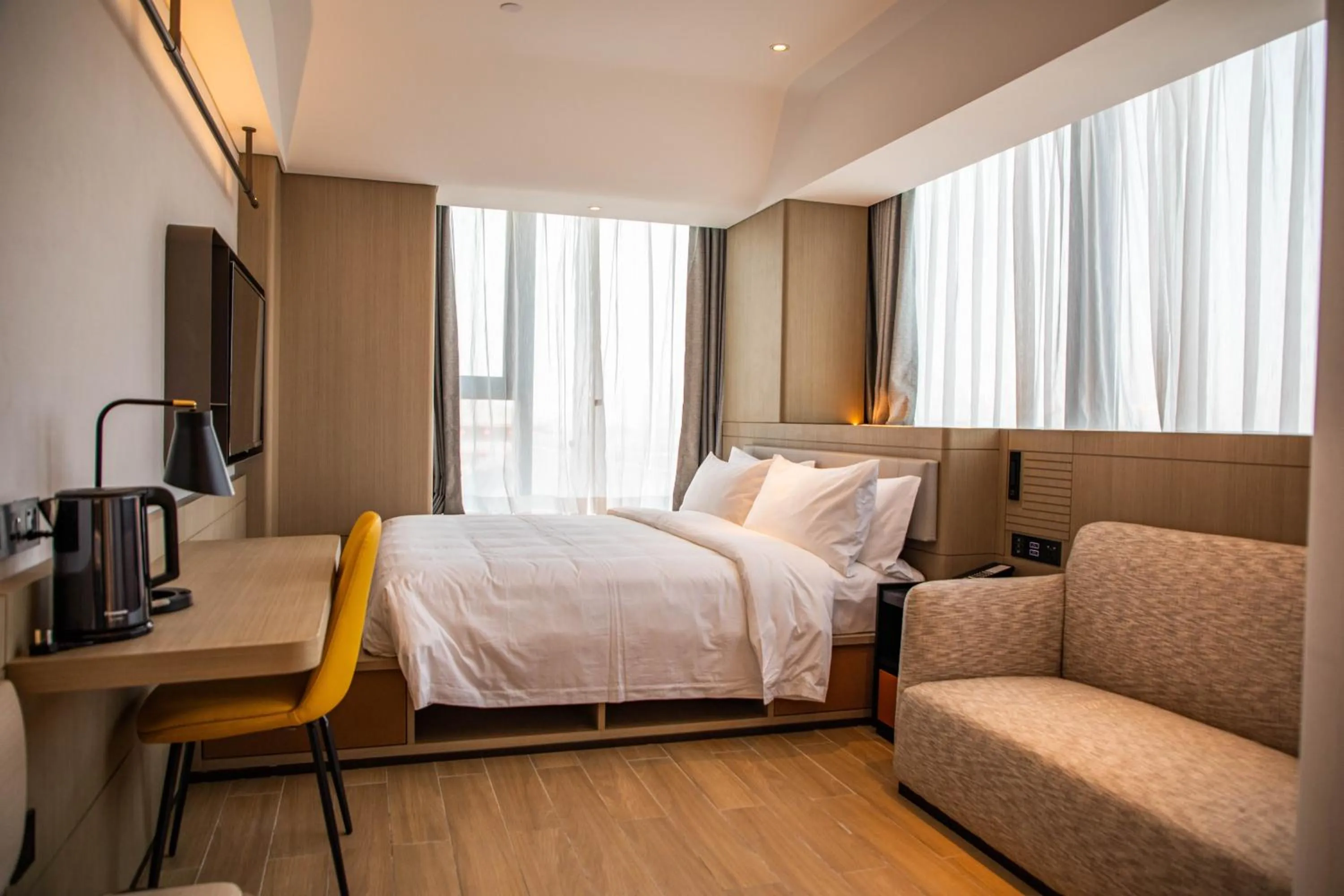 Photo of the whole room, Bed in lyf Dayanta Xi'an by the Ascott Limited free gym & free park & free laundry room