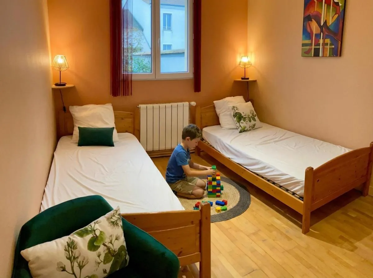 Bed in La Villa des Roses Gîte Chambres d'hôtes Piscine chauffée