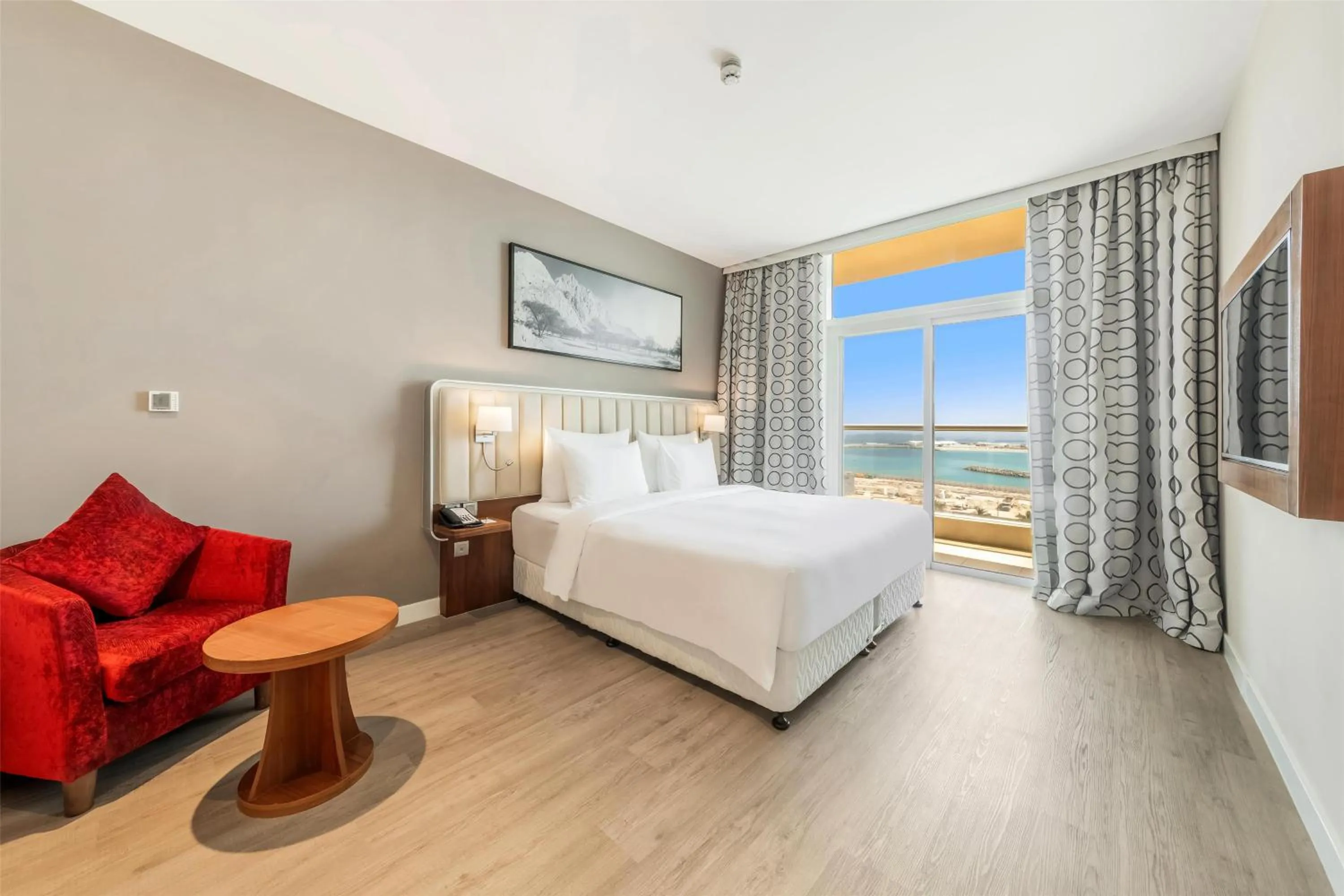 Photo of the whole room, Bed in Radisson Resort Ras Al Khaimah Marjan Island