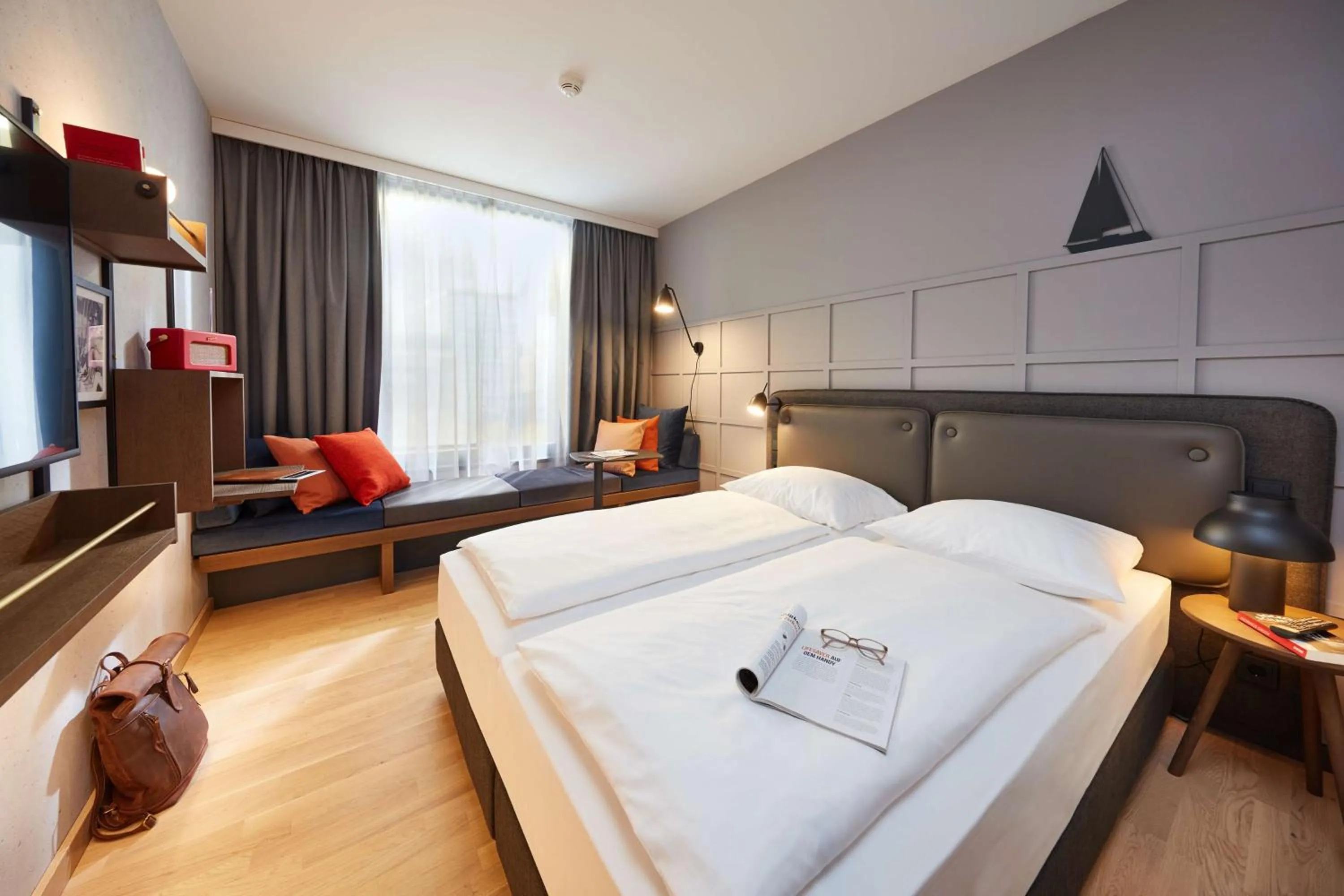 Photo of the whole room, Bed in unique by ATLANTIC Hotels Kiel