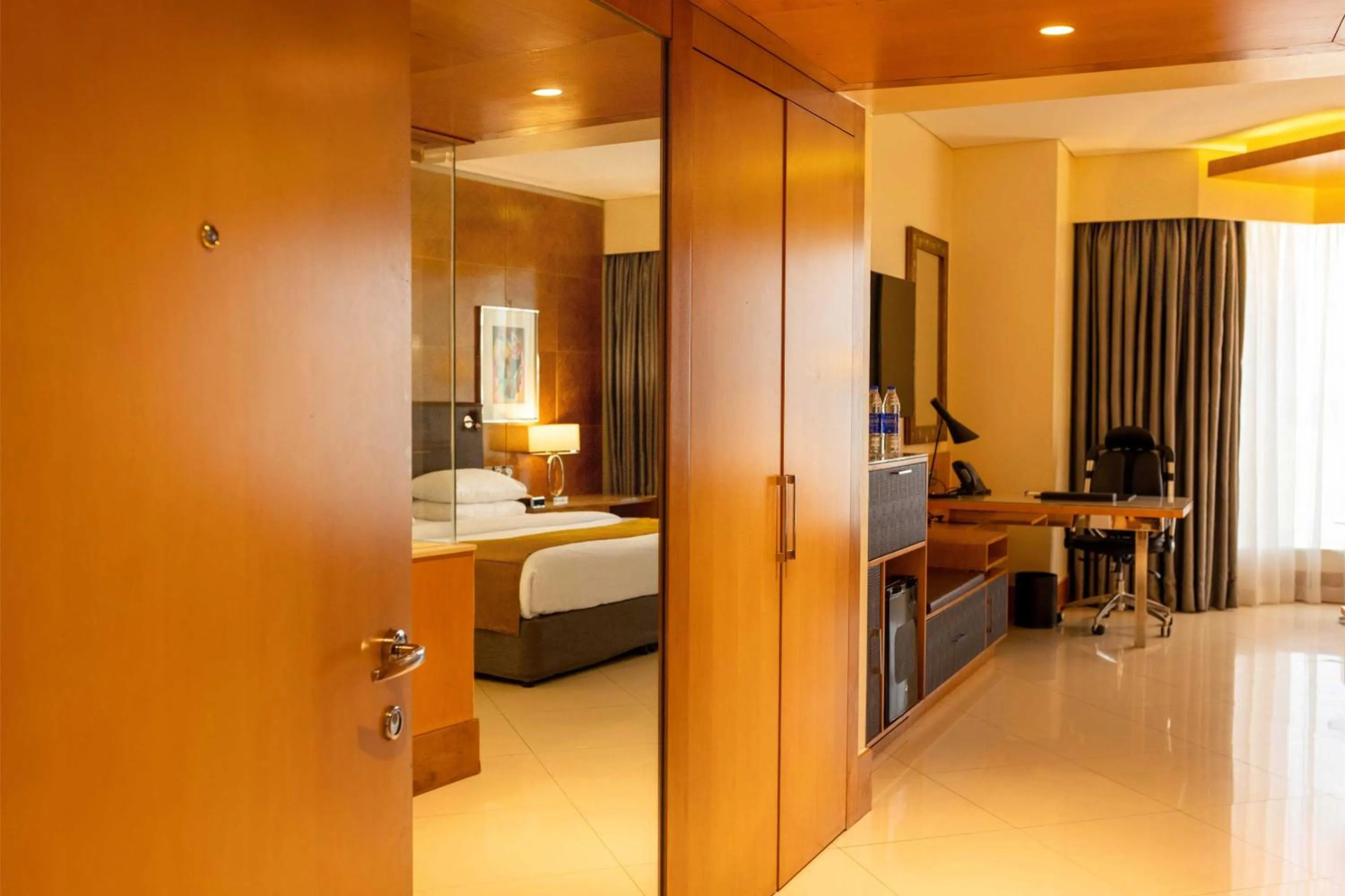 Living room, Bed in Lagos Continental Hotel