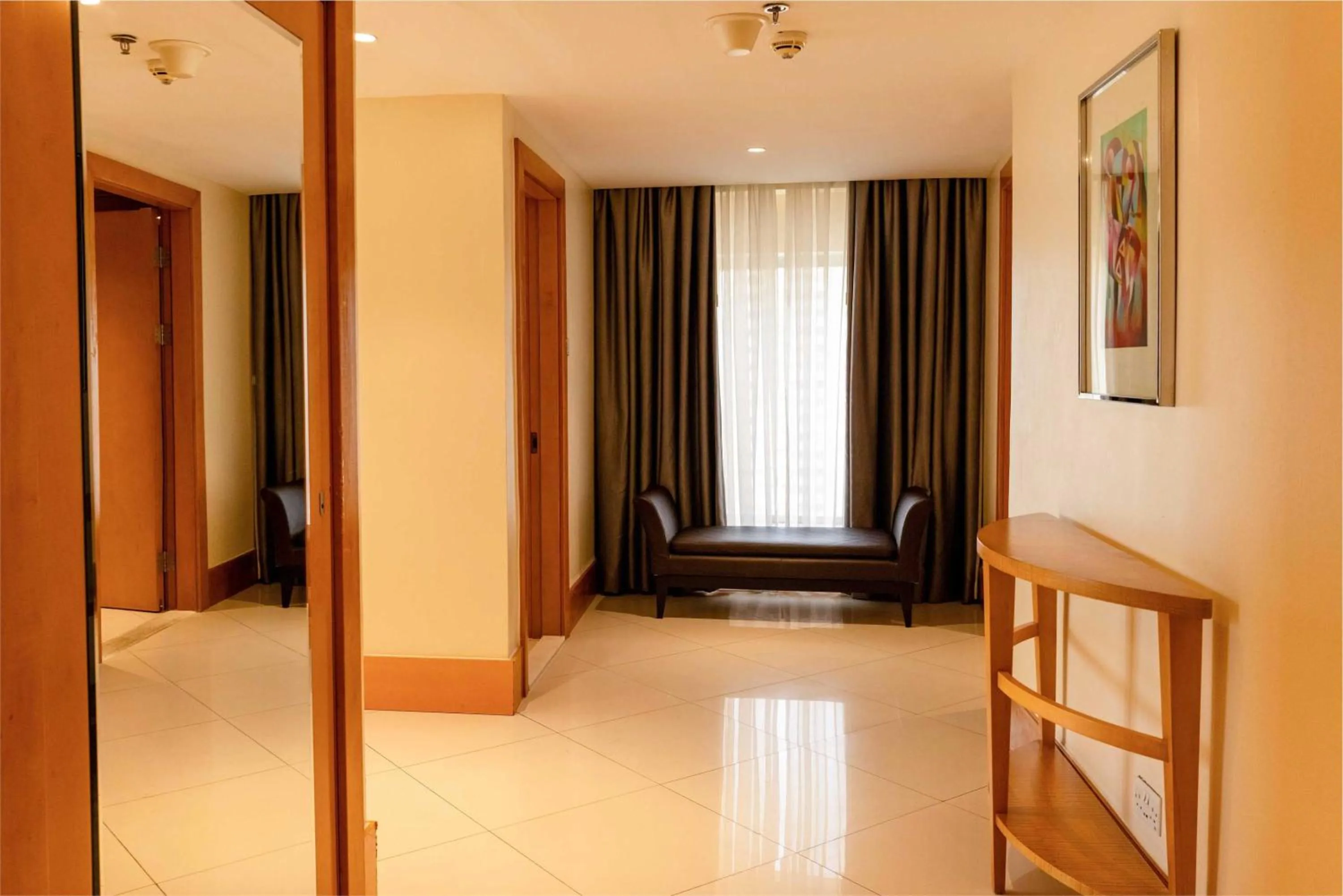 Seating area, Bed in Lagos Continental Hotel