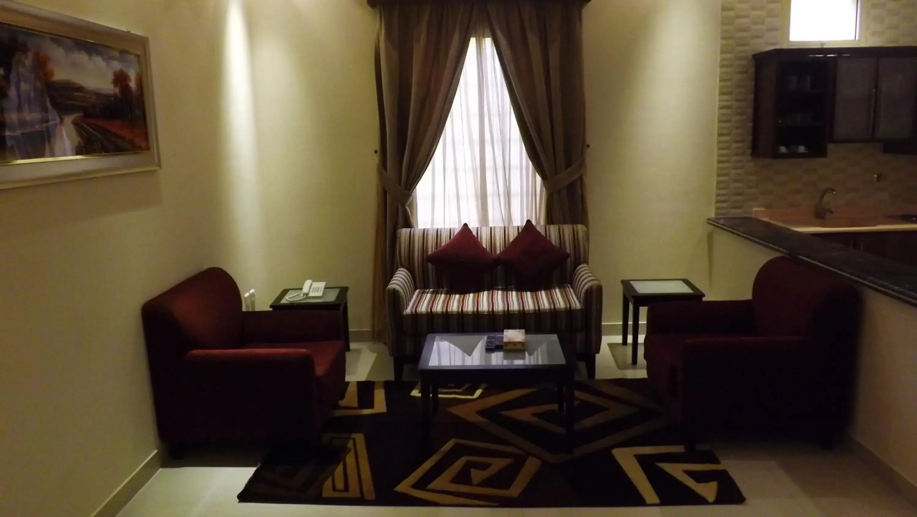 Living room in Taleen Serviced Apartments AlMasif Living room in Taleen Serviced Apartments AlMasif