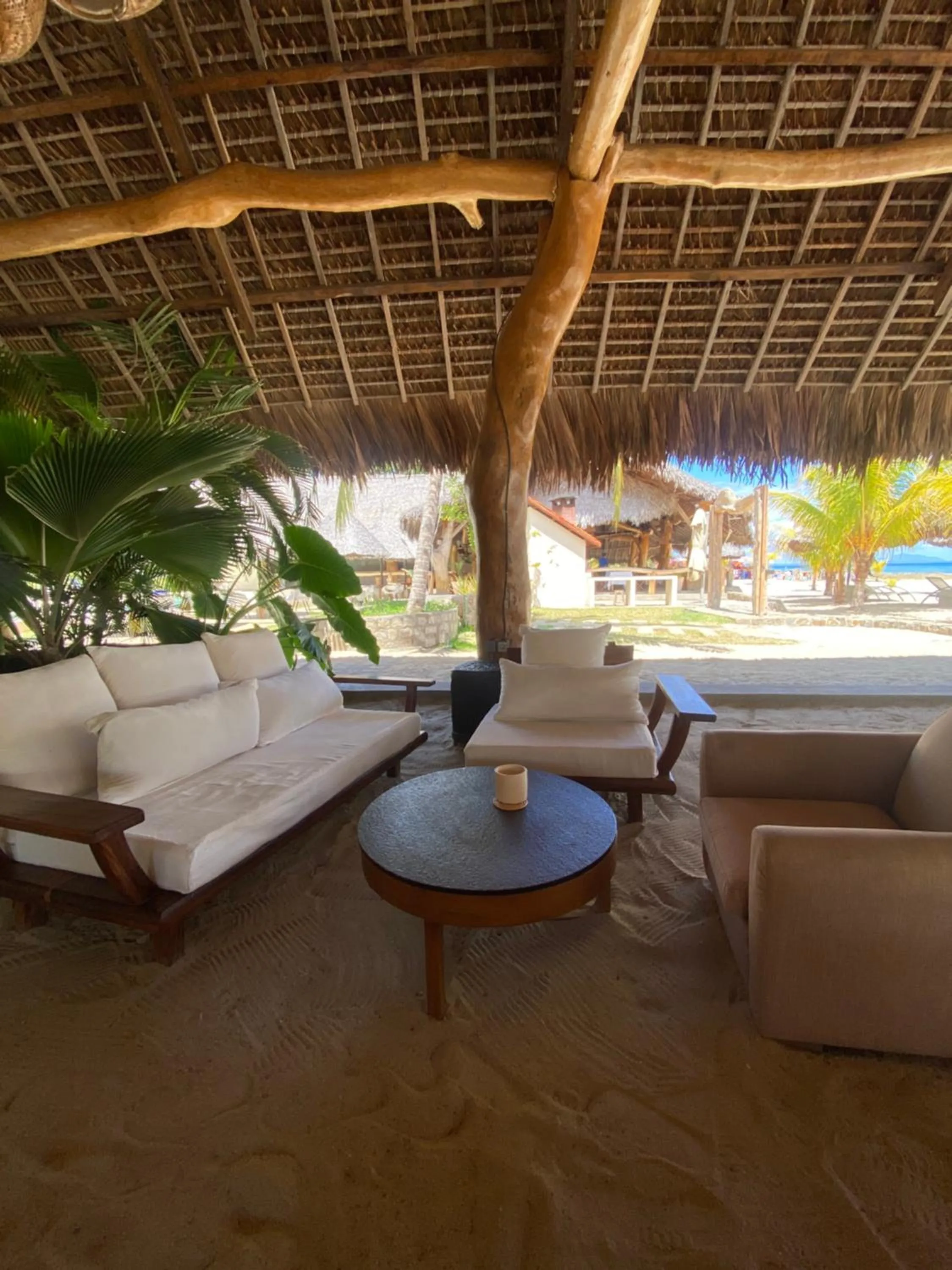 Communal lounge/ TV room in Nosy Be Hotel & Spa