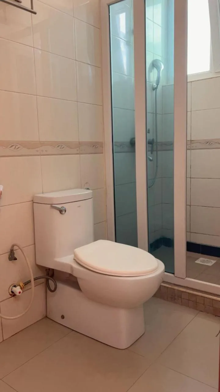 Toilet in Rainbow Hotel