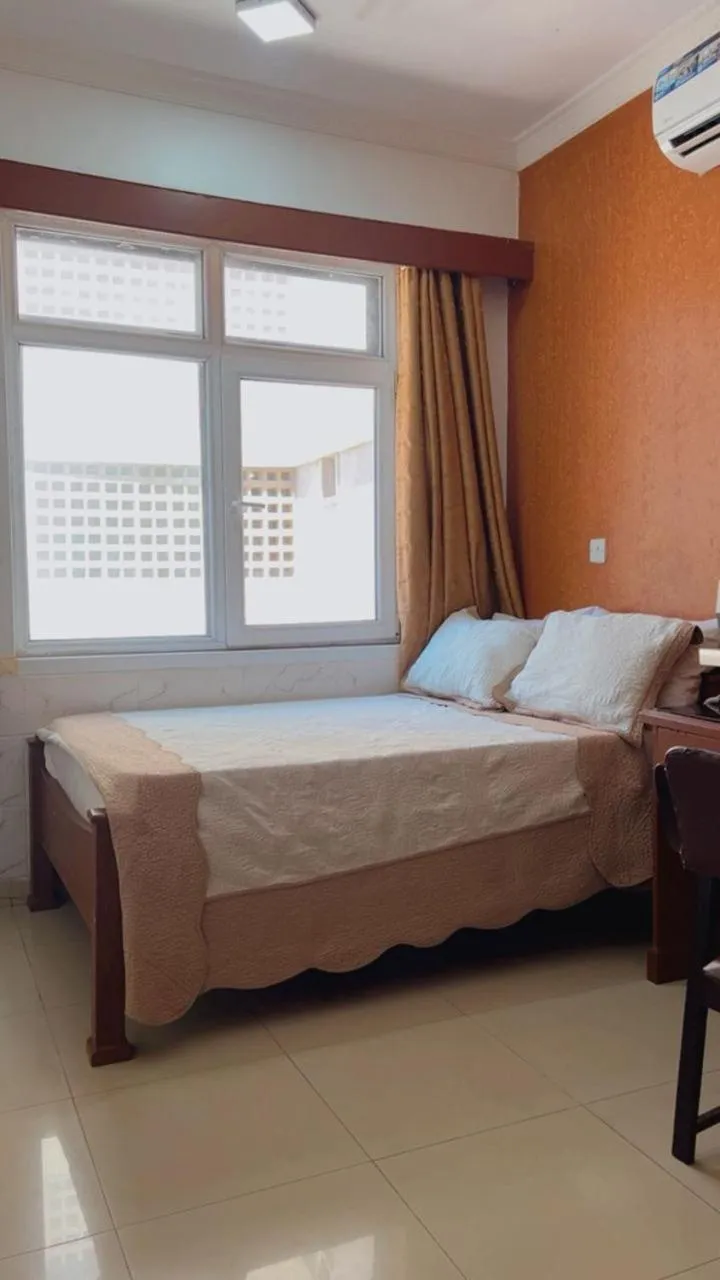 Bed in Rainbow Hotel