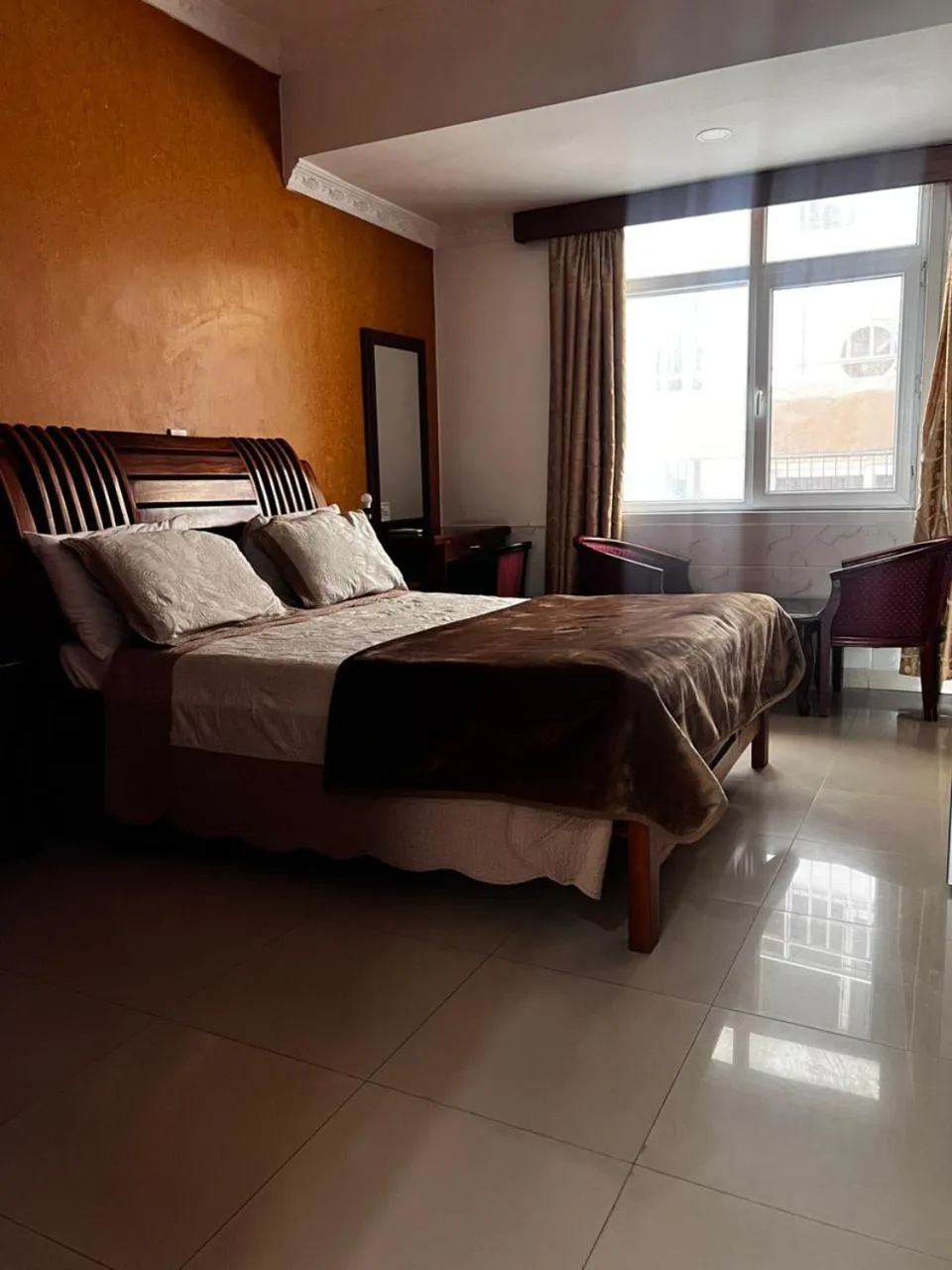 Bed in Rainbow Hotel