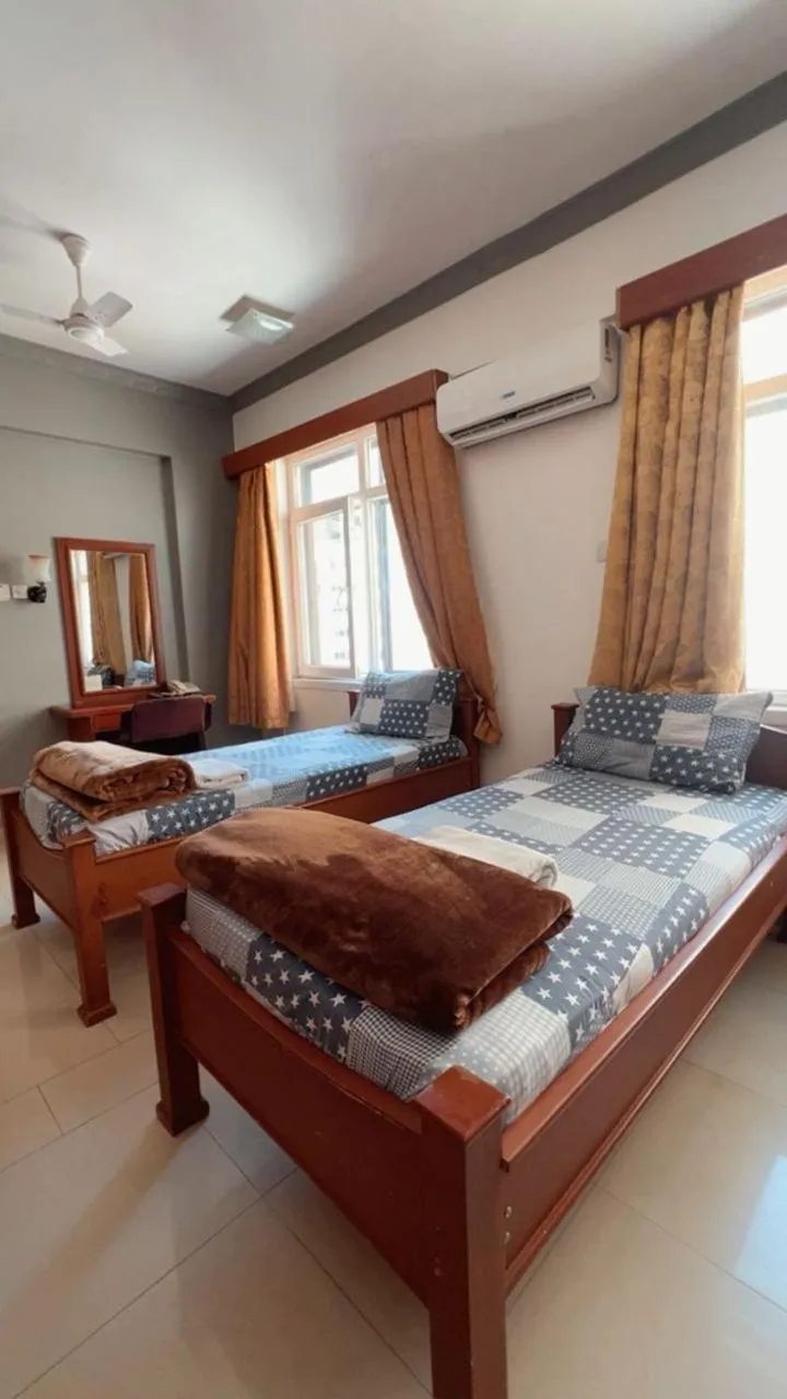 Bed in Rainbow Hotel