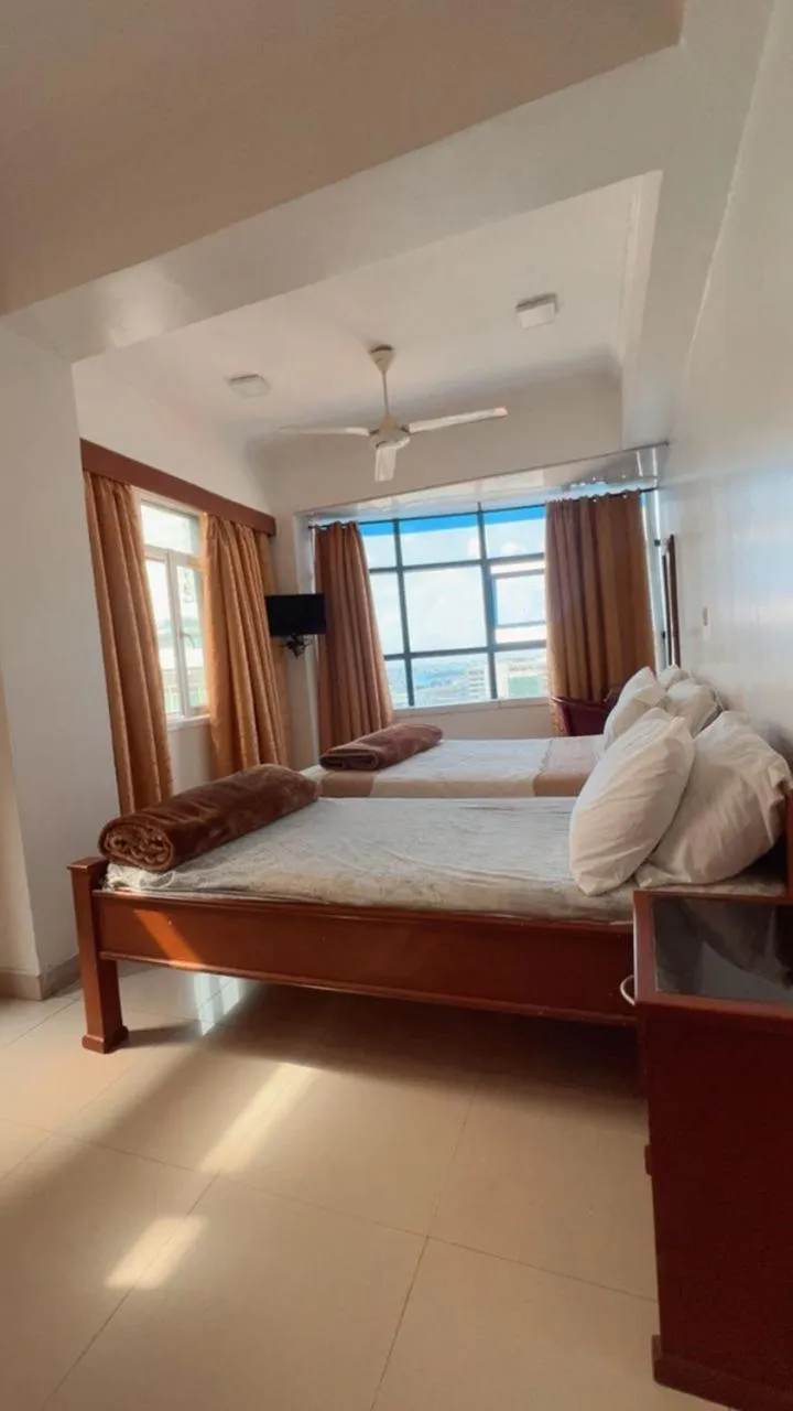 Bed in Rainbow Hotel