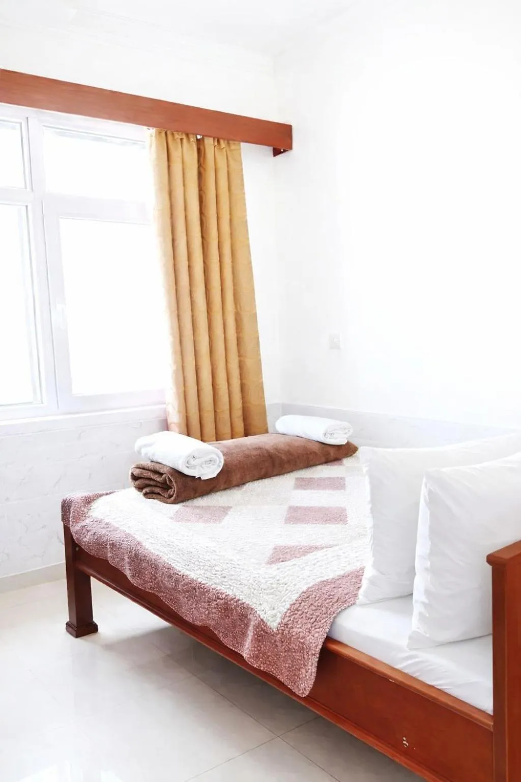 Bed in Rainbow Hotel