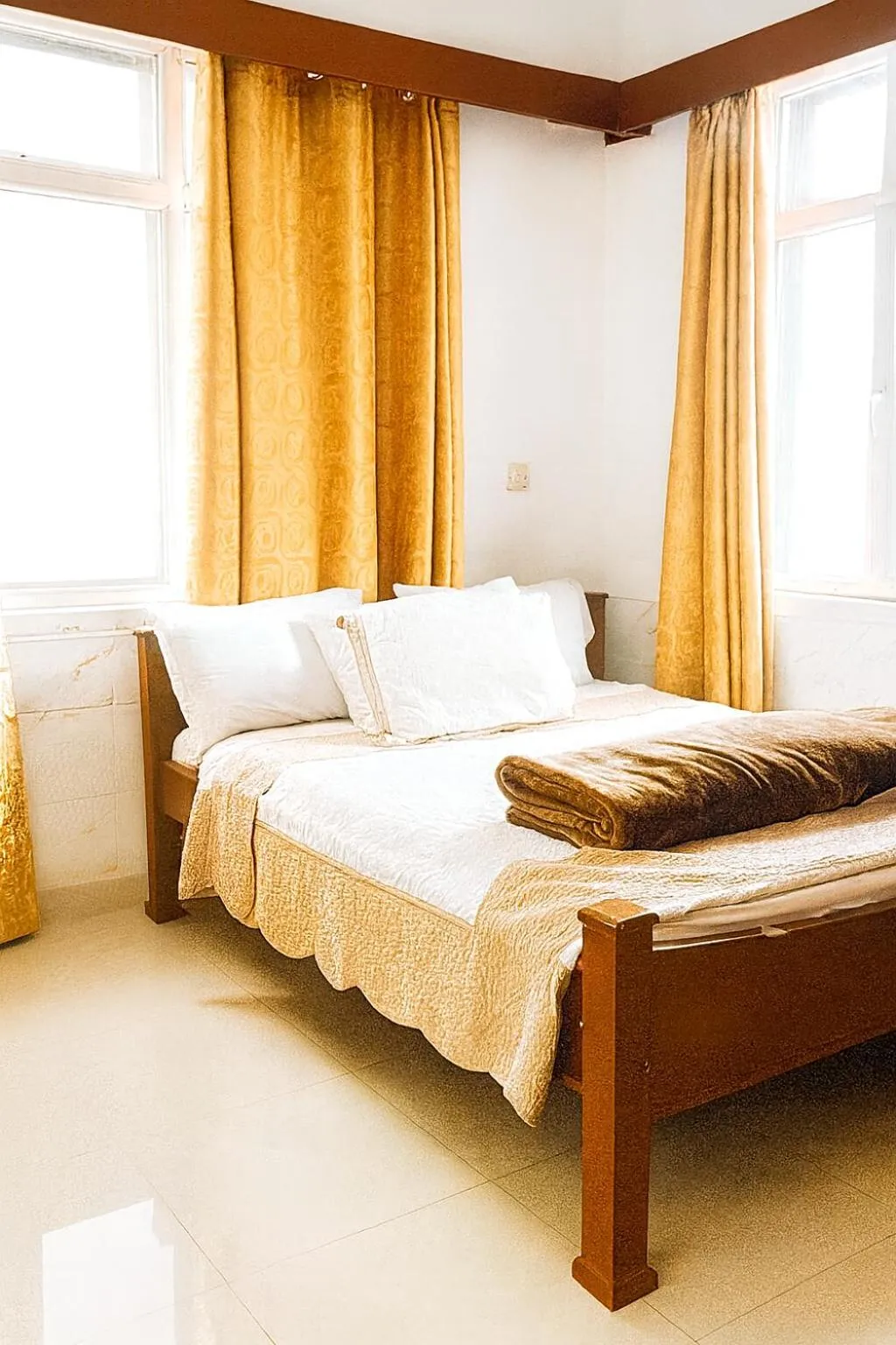 Bed in Rainbow Hotel