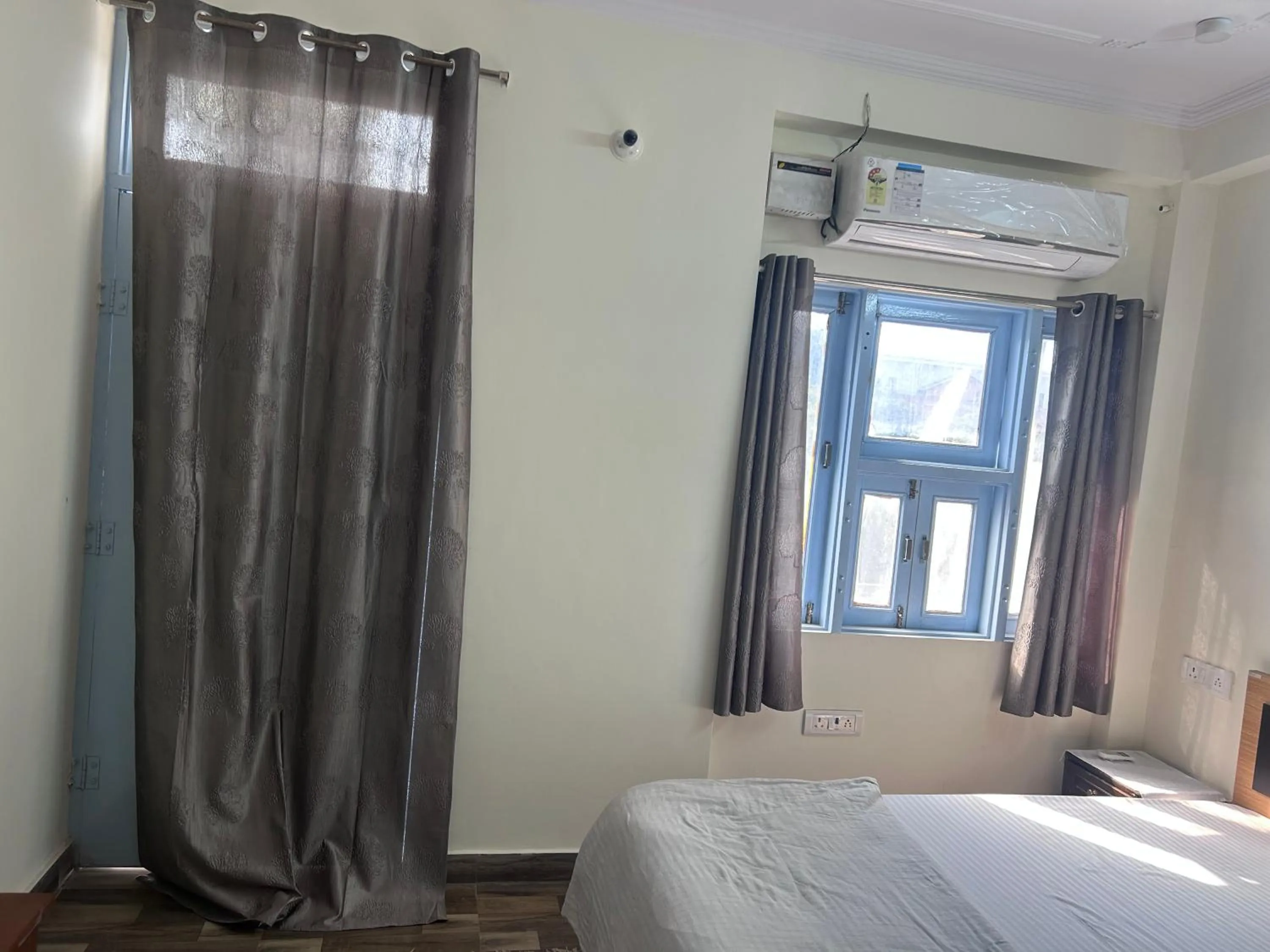 Bed in Golden Peacock Heritage Home Stay