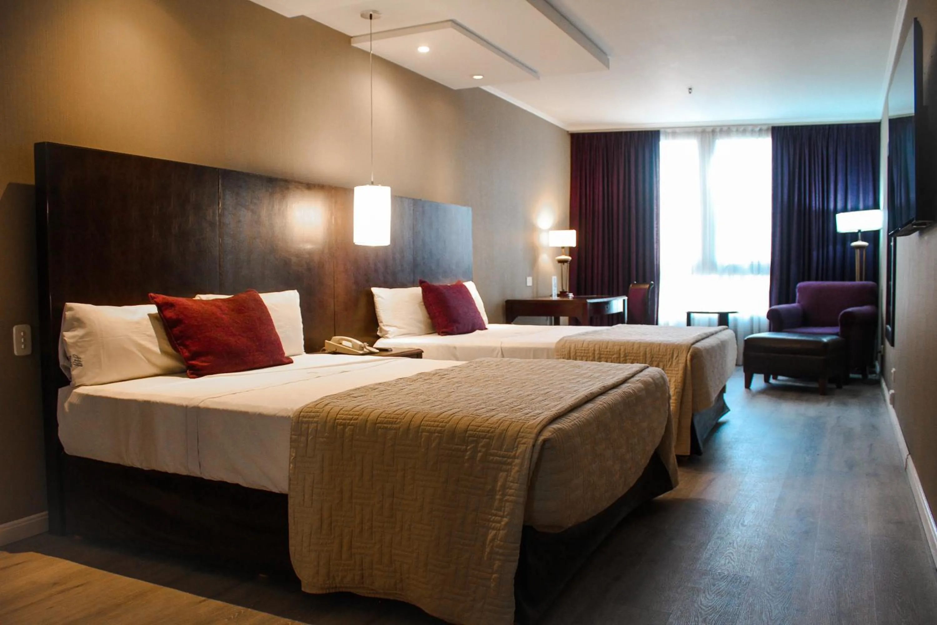 Bed in Howard Johnson Plaza by Wyndham Buenos Aires Florida Street