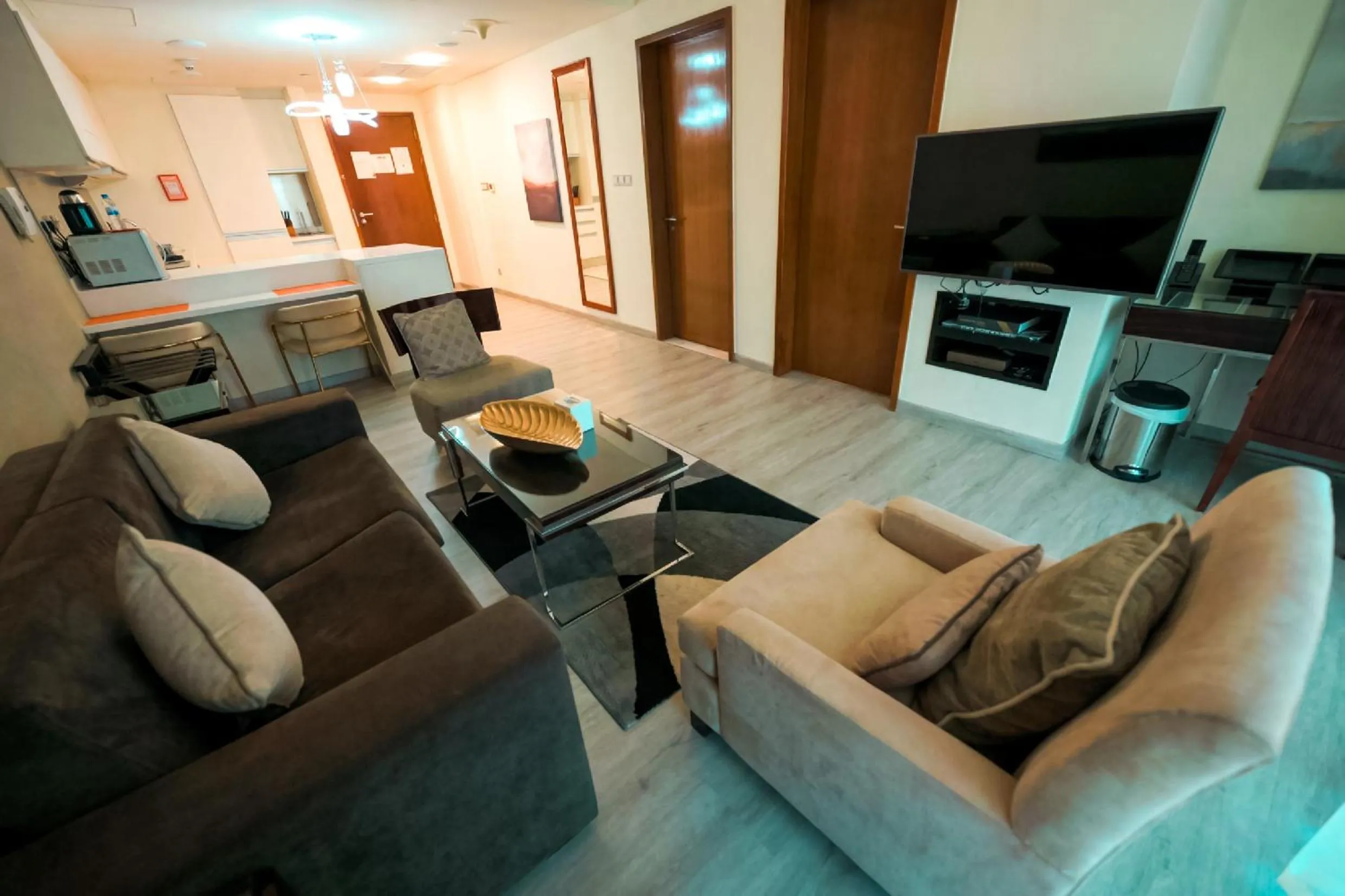 Communal lounge/ TV room in Emaar Fashion Avenue one bedroom - Formerly Address Dubai Mall Four Apple Holiday Homes