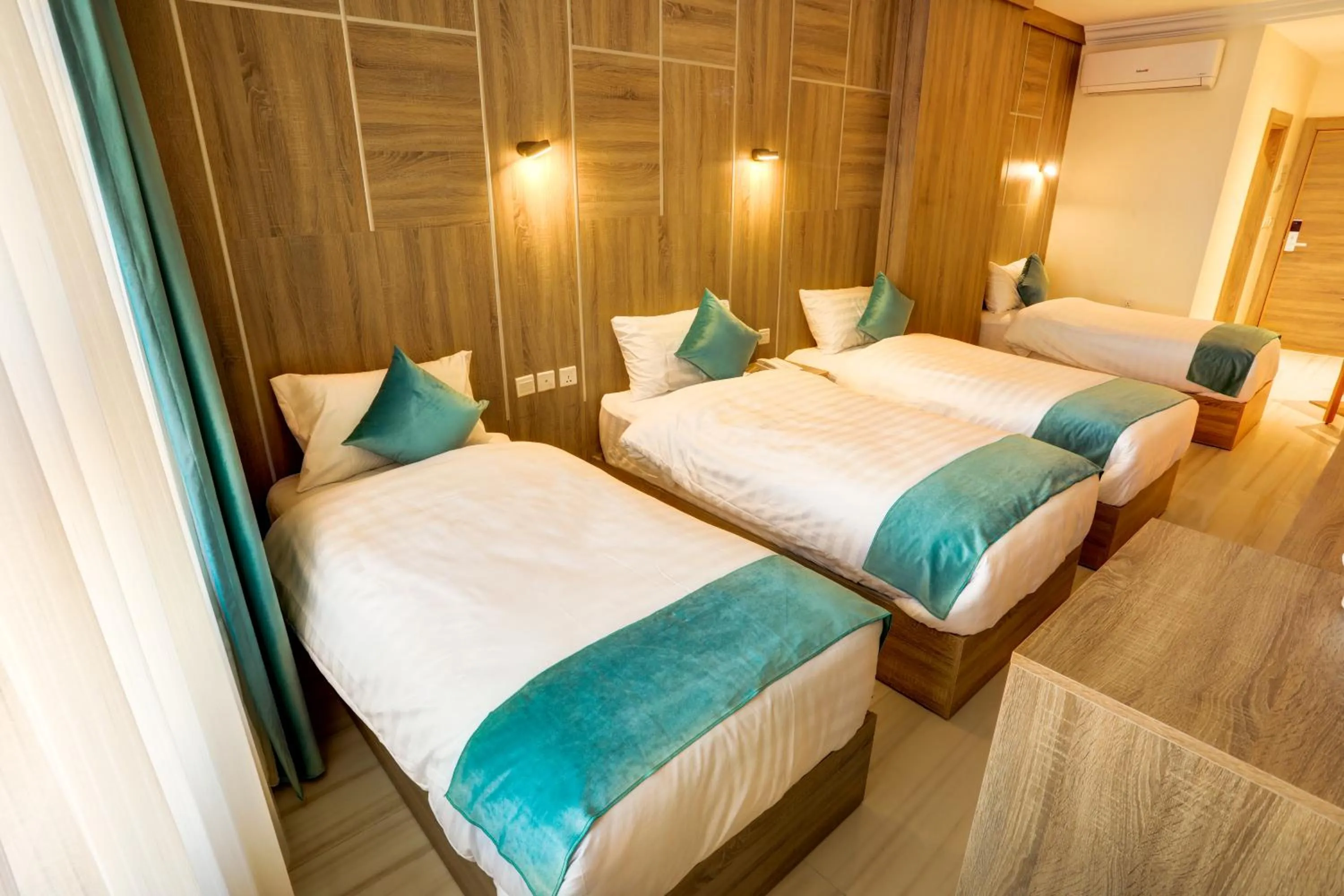 Bed in Turquoise Hotel