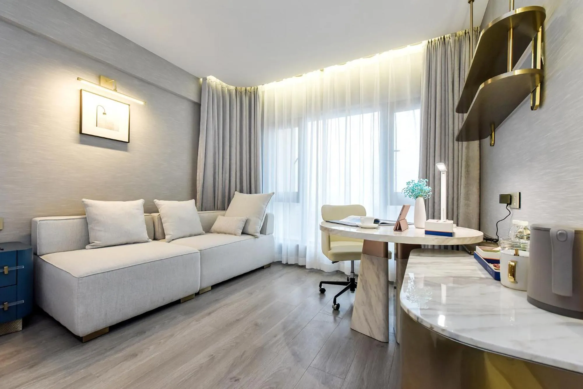 Seating area in Kuanrong Suites Hotel Liangjiang love sea shopping park