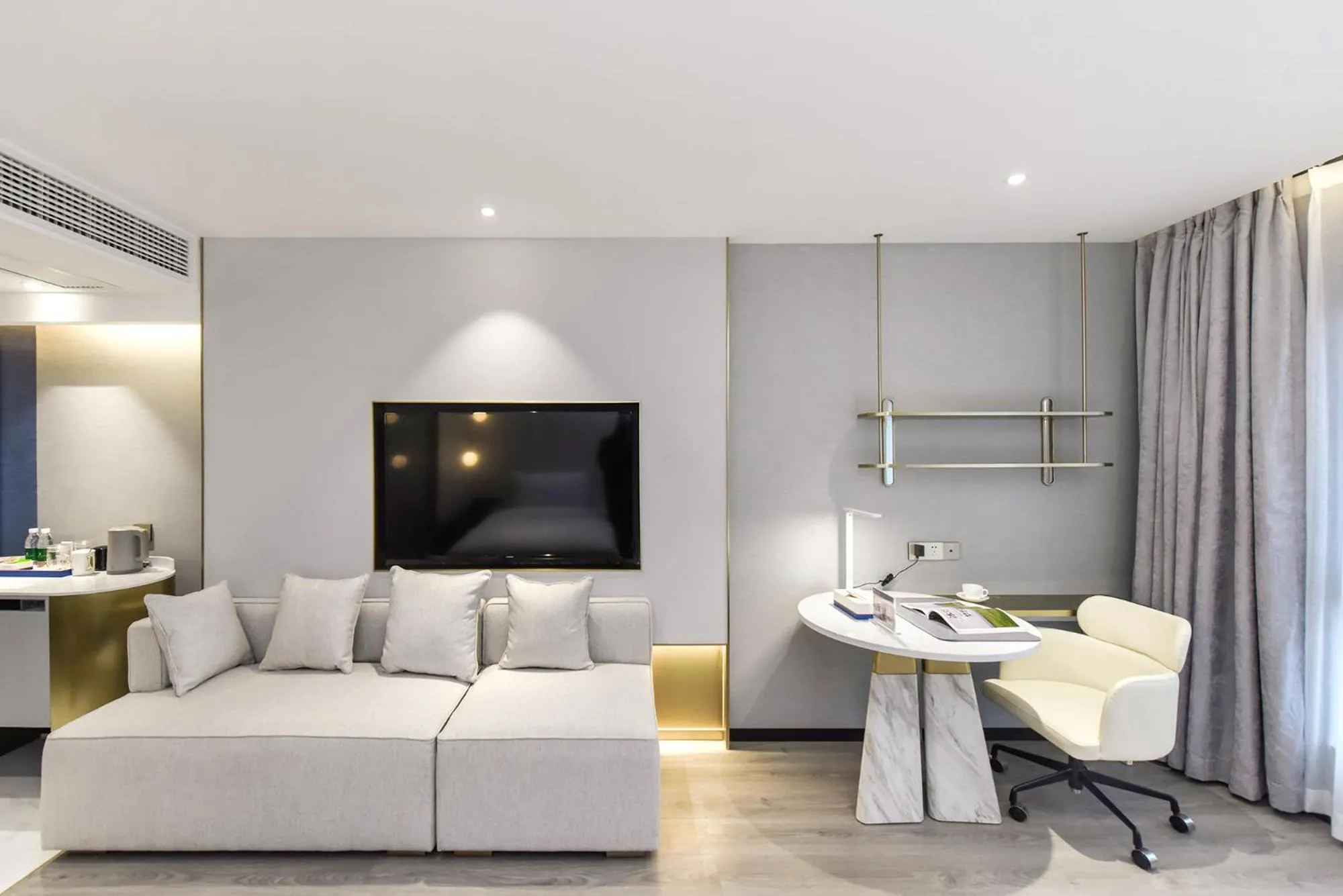 Living room in Kuanrong Suites Hotel Liangjiang love sea shopping park