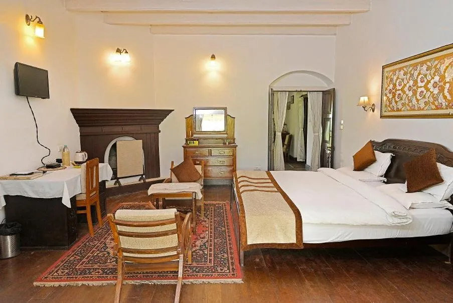 Bed in Tumsong Tea Retreat