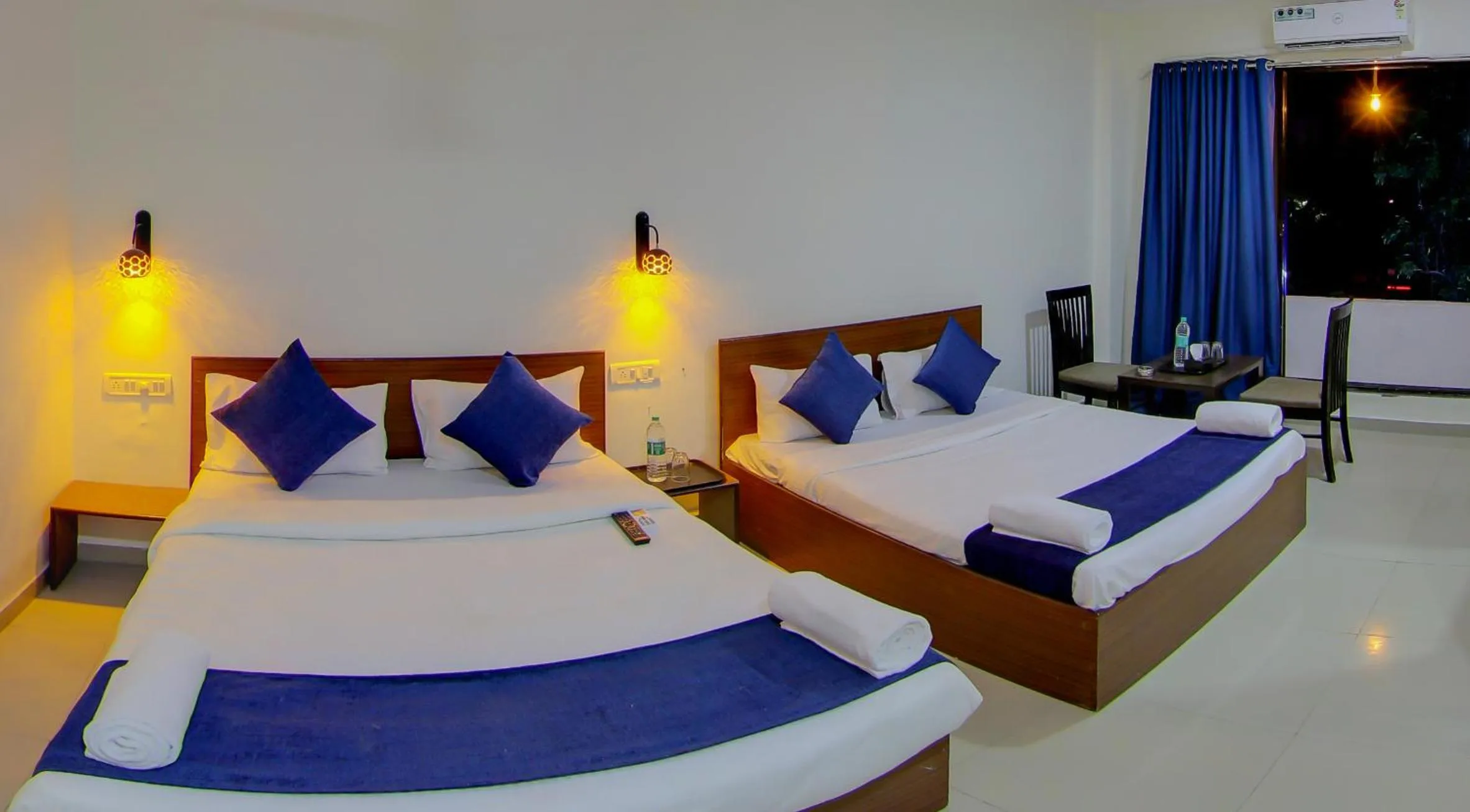 Bed in Hotel Rain Sky Inn