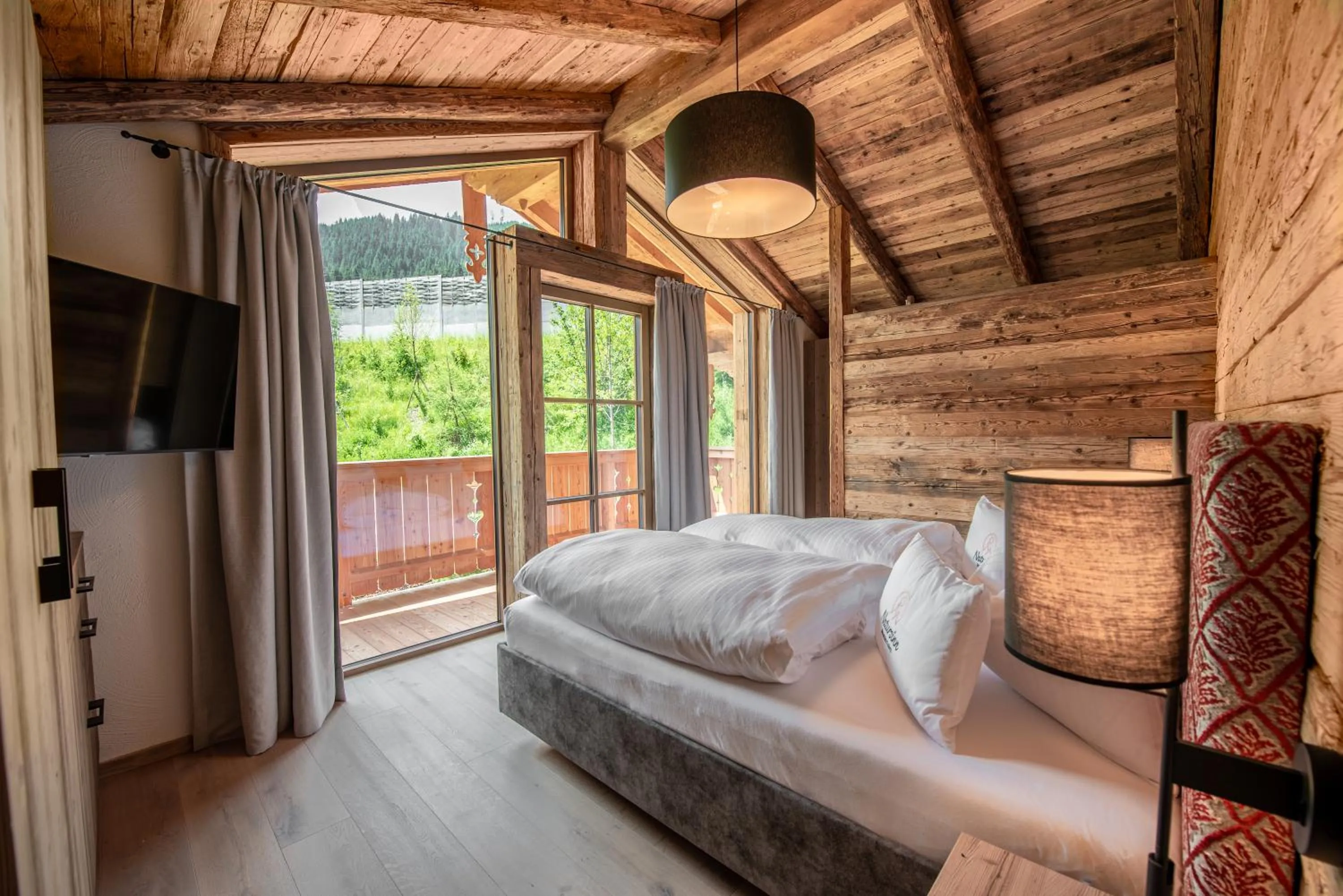 Bed in Natursinn Mountainchalets